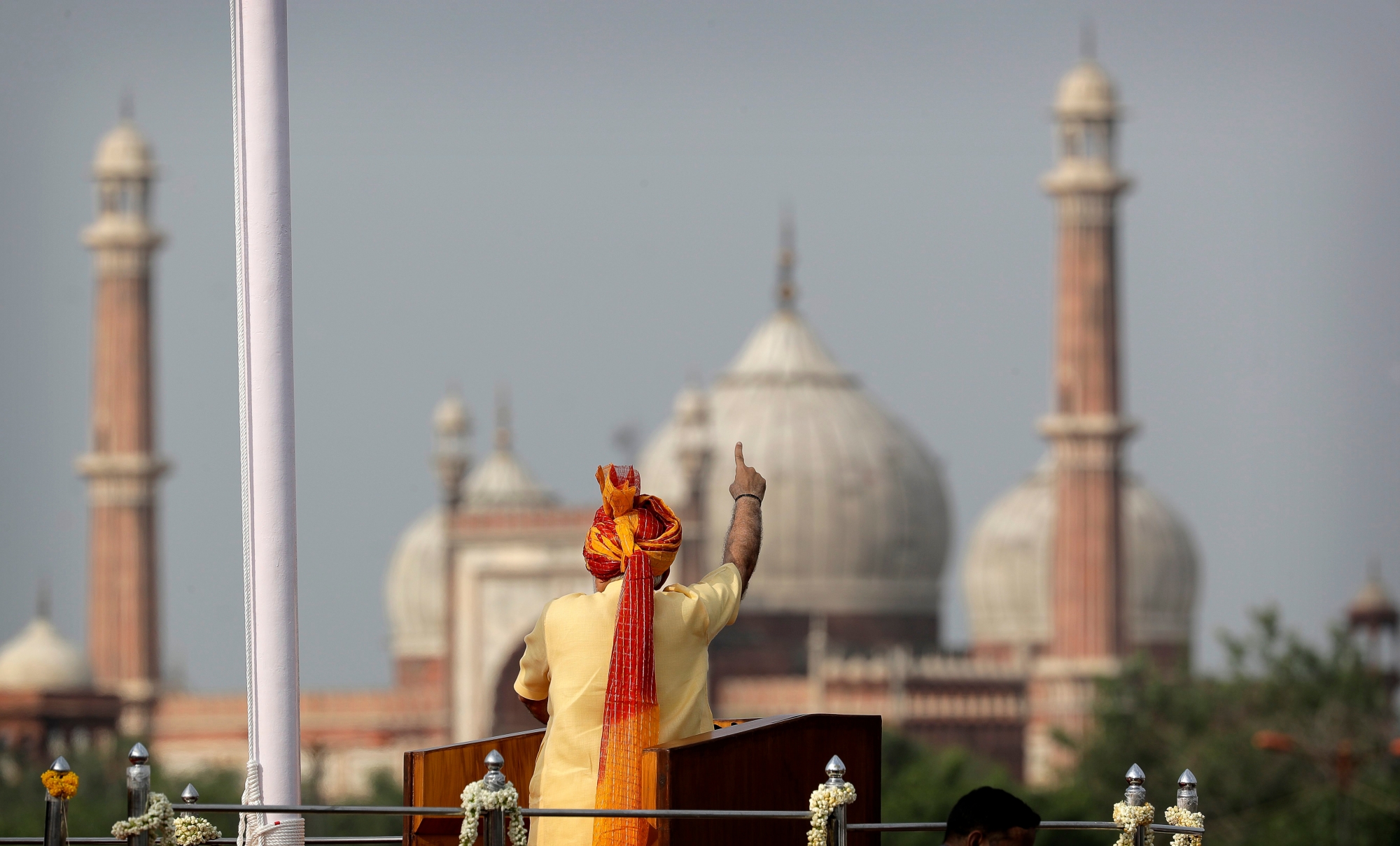 Indian Prime Minister Narendra Modi addresses the nation on the country's Independence Day from the ramparts of the historical Red Fort in New Delhi, India, Tuesday, Aug. 15, 2017.  India is commemorating its independence in 1947 from British colonial rule. In the background is Jama Masjid. (AP Photo/Manish Swarup) India Independence Day