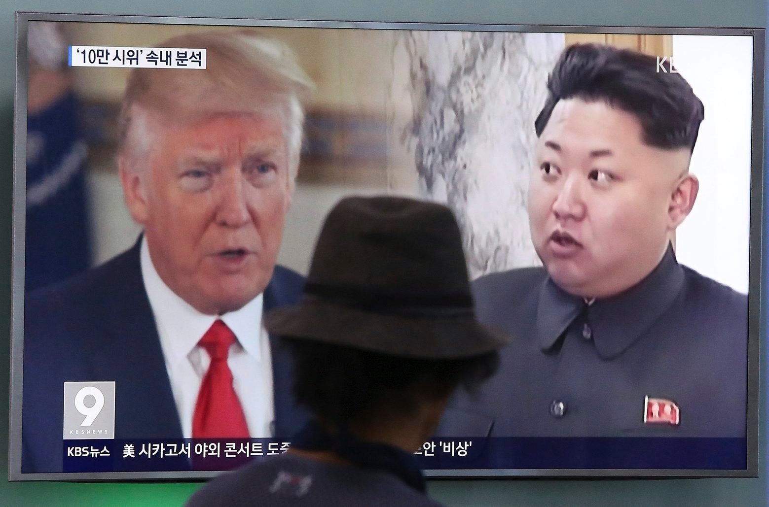 FILE- In this Aug. 10, 2017, file photo, a man watches a television screen showing U.S. President Donald Trump, left, and North Korean leader Kim Jong Un during a news program at the Seoul Railway Station in Seoul, South Korea. AmericaÄôs annual joint military exercises with South Korea always frustrate North Korea. The war games set to begin Monday, Aug. 21, 2017 may hold more potential to provoke than ever, given TrumpÄôs Äúfire and furyÄù threats and PyongyangÄôs as-yet-unpursued plan to launch missiles close to Guam. (AP Photo/Ahn Young-joon, File) Koreas Tension War Games