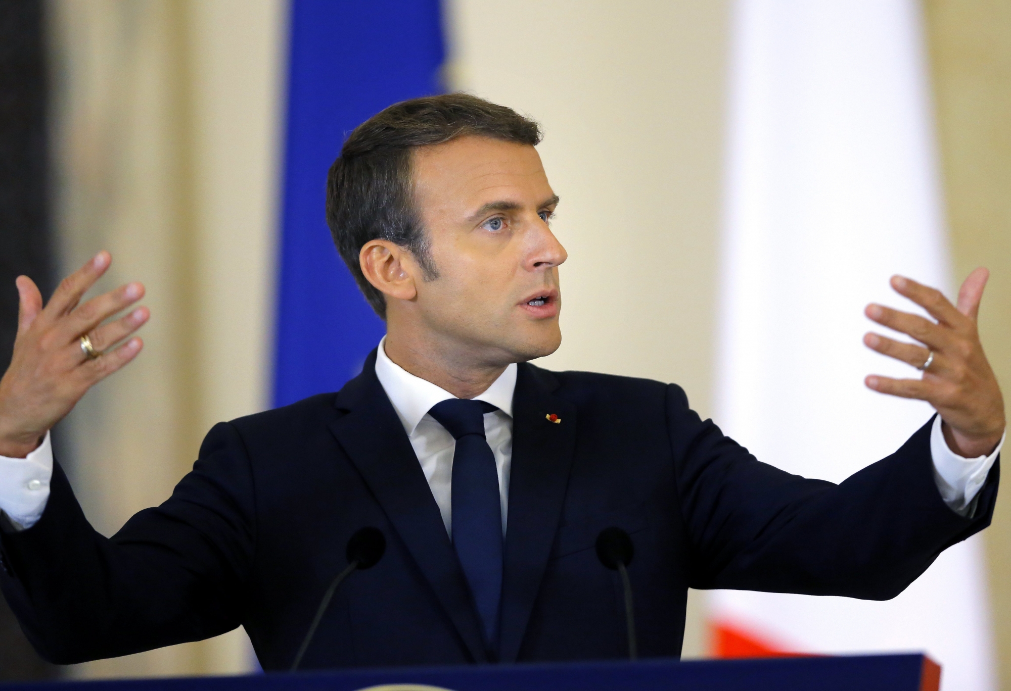 epa06159902 French President Emmanuel Macron gestures while answereing to journalists' questions on new labor regulation during a joint news conference with his Romanian counterpart Klaus Iohannis (not pictured) at the Cotroceni Palace, in Bucharest, Romania, 24 August 2017. Macron is on a one-day official visit to Romania, as part of his central and east European tour.  EPA/ROBERT GHEMENT ROMANIA FRANCE DIPLOMACY