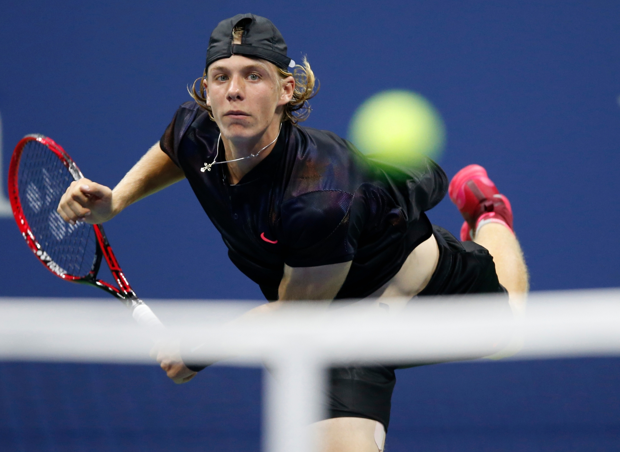 Denis Shapovalov, of Canada, serves to Jo-Wilfried Tsonga, of France, at the U.S. Open tennis tournament in New York, Wednesday, Aug. 30, 2017. (AP Photo/Kathy Willens) US Open Tennis