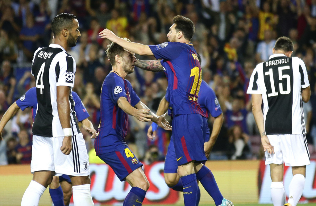Ivan Rakitic et Lionel Messi exultent. Le Barça a balayé la Juventus.