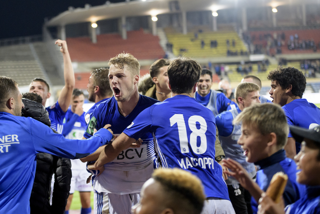 Les joueurs lausannois fêtent leur première victoire en plus d'un an. 