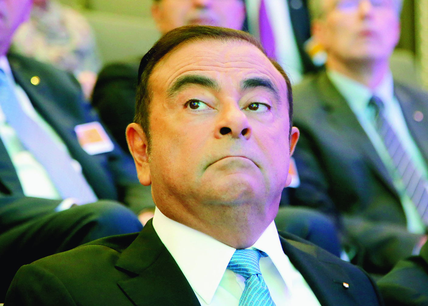 Renault Group CEO Carlos Ghosn attend a media conference at La Defense business district, outside Paris, France, Friday, Oct. 6, 2017. French carmaker Renault says half of its models will be electric or hybrid by 2022 and it's investing heavily in "robo-vehicles" with increasing degrees of autonomy. (AP Photo/Michel Euler) France Renault