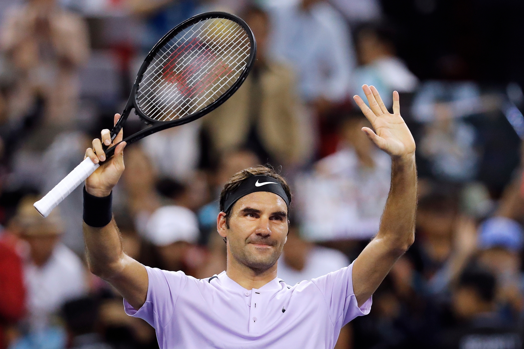 Roger Federer of Switzerland gestures to the spectators after defeating Diego Schwartzman of Argentina in their men's singles match in the Shanghai Masters tennis tournament at Qizhong Forest Sports City Tennis Center in Shanghai, China, Wednesday, Oct. 11, 2017. (AP Photo/Andy Wong) China Tennis Shanghai Masters