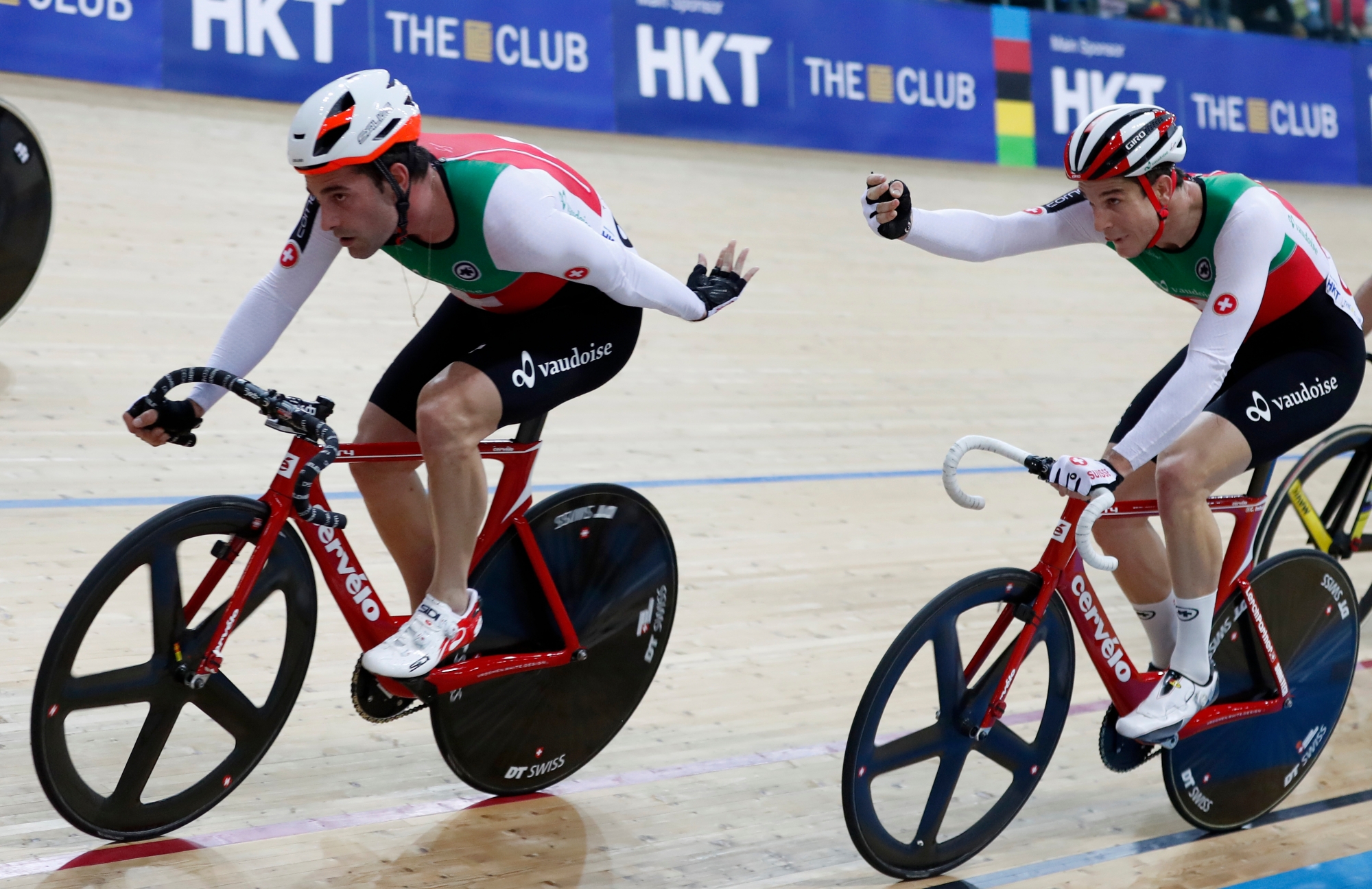 Switzerland's Tristan Marguet and Claudio Imhof tag during the men's madison final at the World Track Cycling championships in Hong Kong, Sunday, April 16, 2017. (AP Photo/Kin Cheung)marguet HONG KONG WORLD TRACK CYCLING CHAMPIONSHIPS