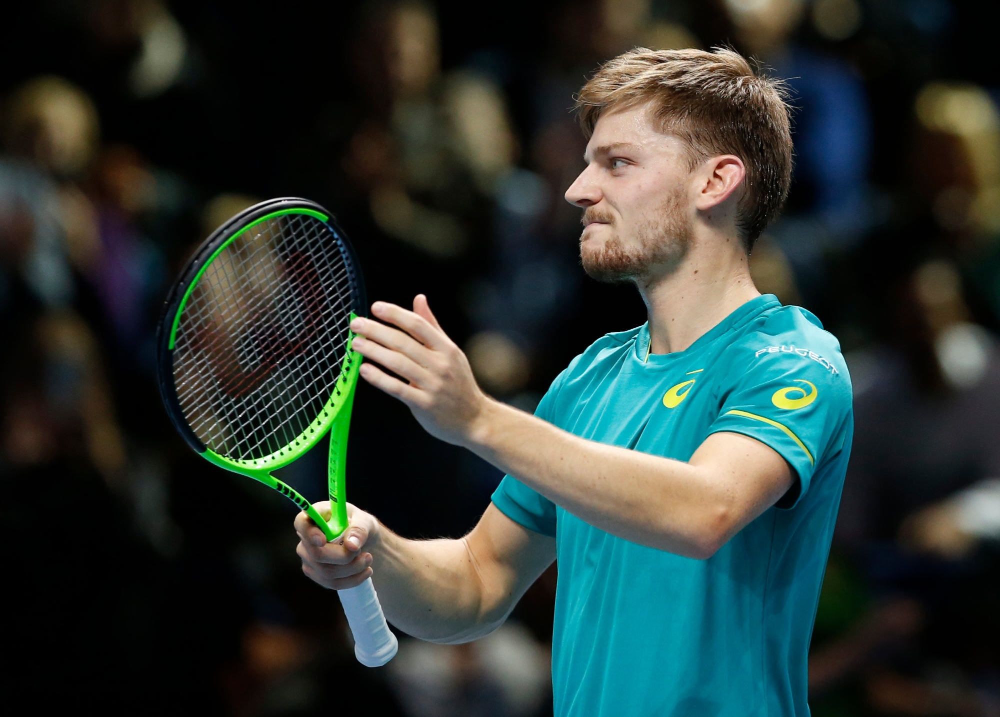 David Goffin of Belgium celebrates after defeating Dominic Thiem of Austria in their men's singles tennis match at the ATP World Finals at the O2 Arena in London, Friday, Nov. 17, 2017. (AP Photo/Alastair Grant) Britain Tennis ATP Finals