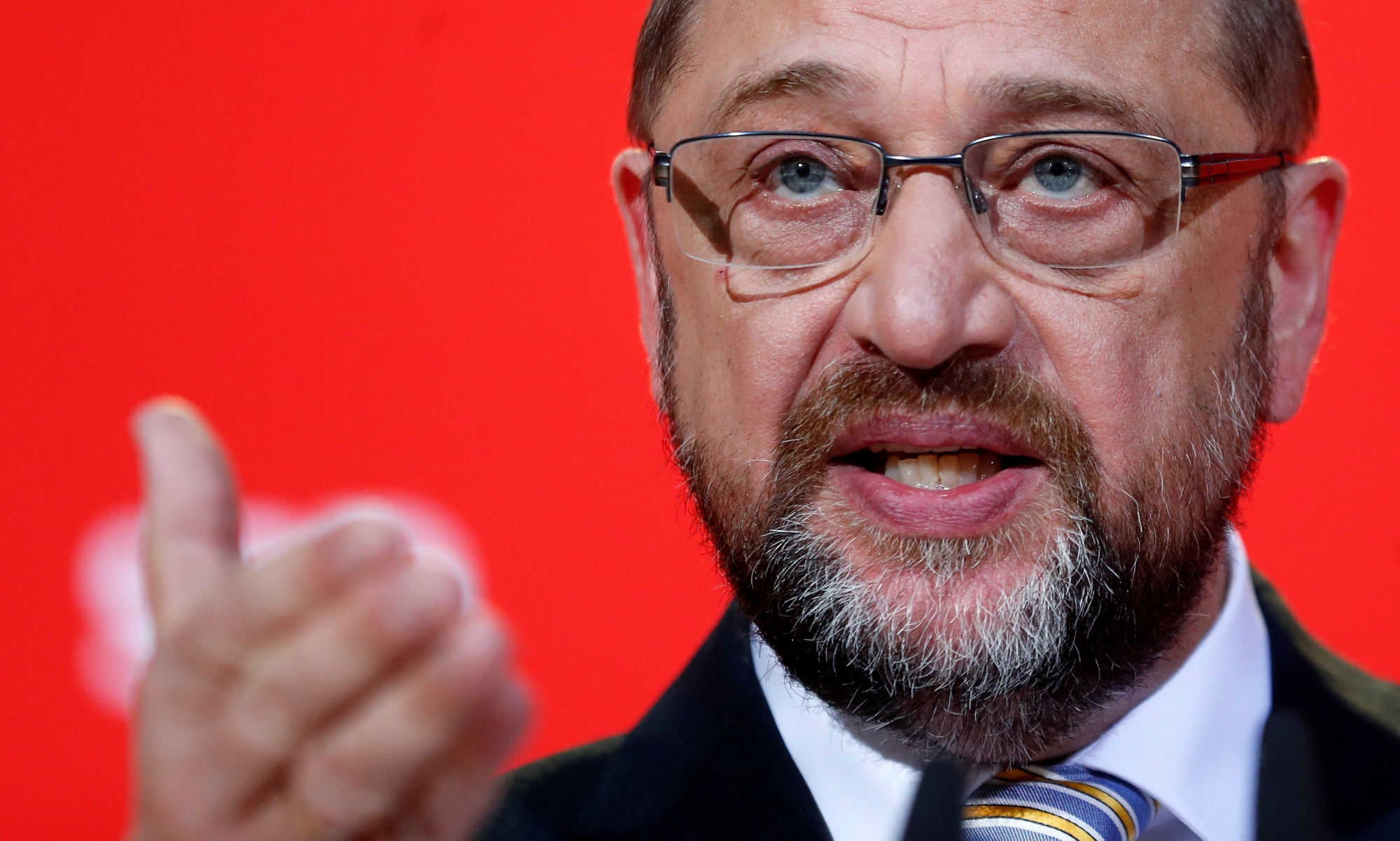 epa06354155 The leader of the German Social Democratic Party (SPD), Martin Schulz, speaks during a press conference after the party's board meeting at its headquarters in Berlin, Germany, 27 November 2017. The SPD discussed to start exploratory talks with the Christian Democratic Union (CDU) and explored the possibility of forming a grand coalition like in the last legislative period.  EPA/FELIPE TRUEBA GERMANY ELECTIONS 2017