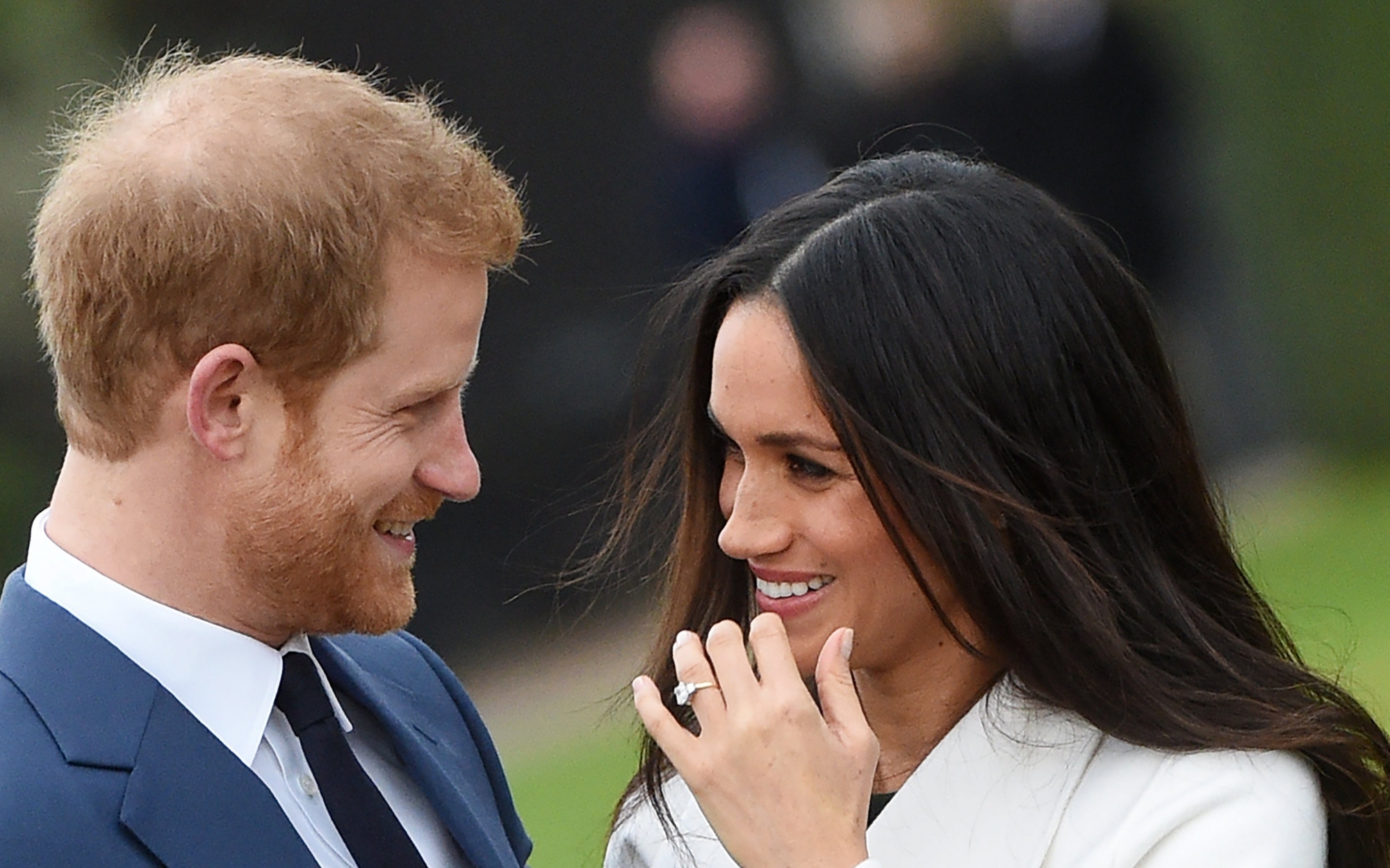 epa06354492 Britain's Prince Harry (L) poses with his fiancee, US actress Meghan Markle during a photocall after announcing their engagement in the Sunken Garden at Kensington Palace in London, Britain, 27 November 2017. Clarence House said in a statement that the couple's wedding ceremony will take place in spring 2018.  EPA/FACUNDO ARRIZABALAGA BRITAIN ROYALTY