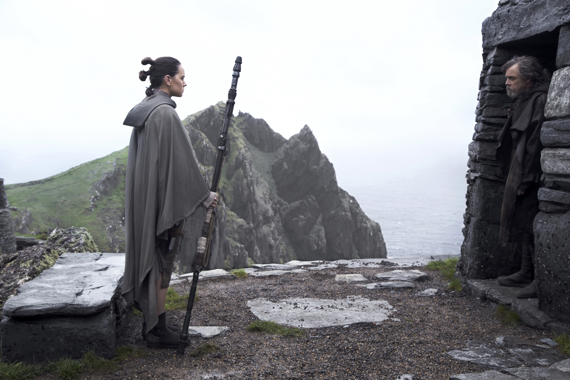 Star Wars: The Last Jedi..L to R: Rey (Daisy Ridley) and Luke Skywalker (Mark Hamill)..Photo: Jonathan Olley..©2017 Lucasfilm Ltd. All Rights Reserved.