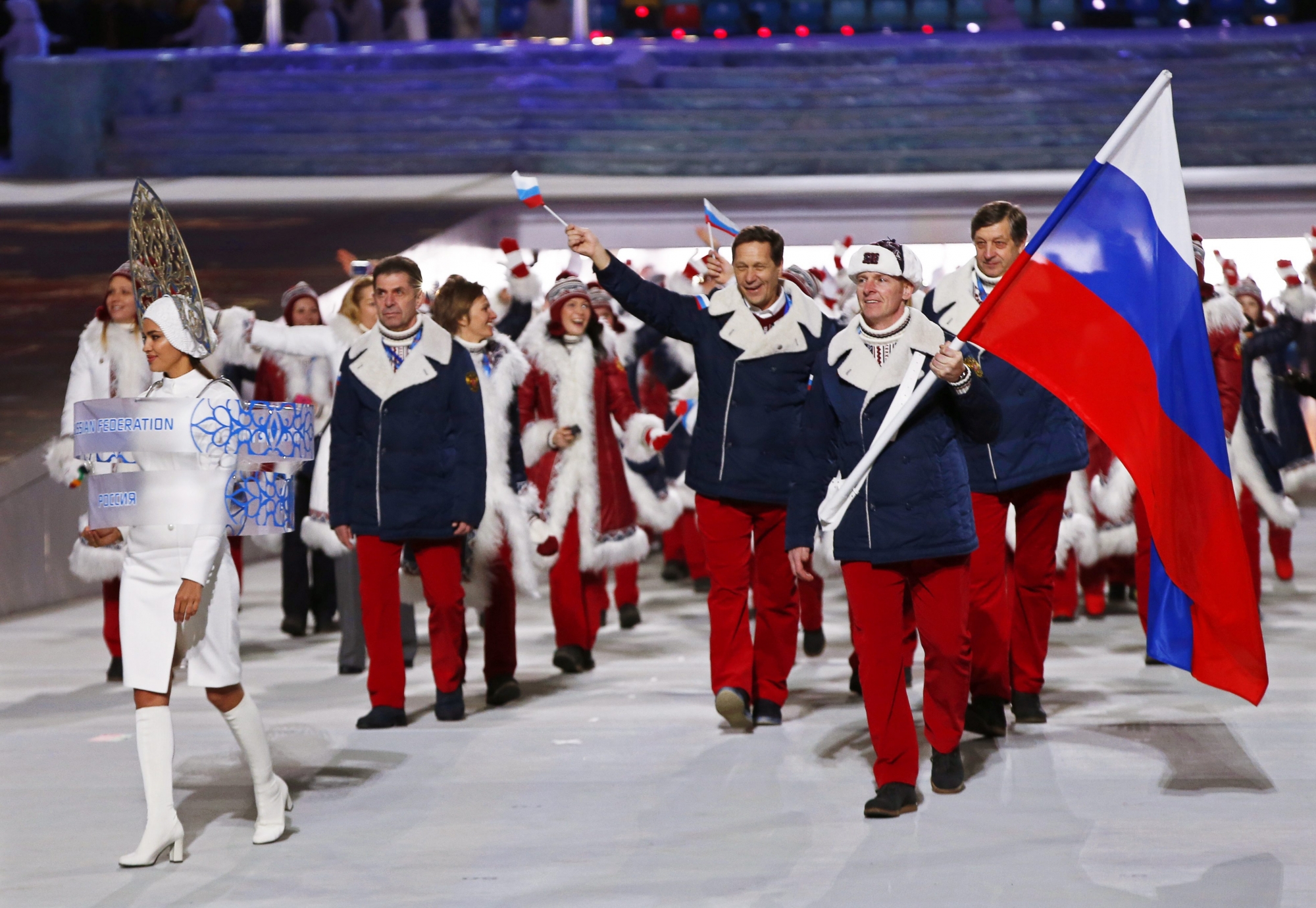 epa05303427 (FILE) A file picture dated 07 February 2014 of Team Russia with flag bearer Alexander Zubkov (R) during the Opening Ceremony of the Sochi 2014 Olympic Games at the Fisht Olympic Stadium in Sochi, Russia. The International Olympic Committee (IOC) on 13 May 2016 called for immediate investigations on allegations of Russian state-sponsored doping at the Sochi 2014 Olympic Games. Grigory Rodchenkov, former head of Russia's anti-doping laboratory, admitted that banned performance-enhancing substances have been supplied and urine samples have been exchanged before and during the Sochi 2014 Olympics, the New York Times reported on 12 May 2016.  EPA/BARBARA WALTON *** Local Caption *** 51215598