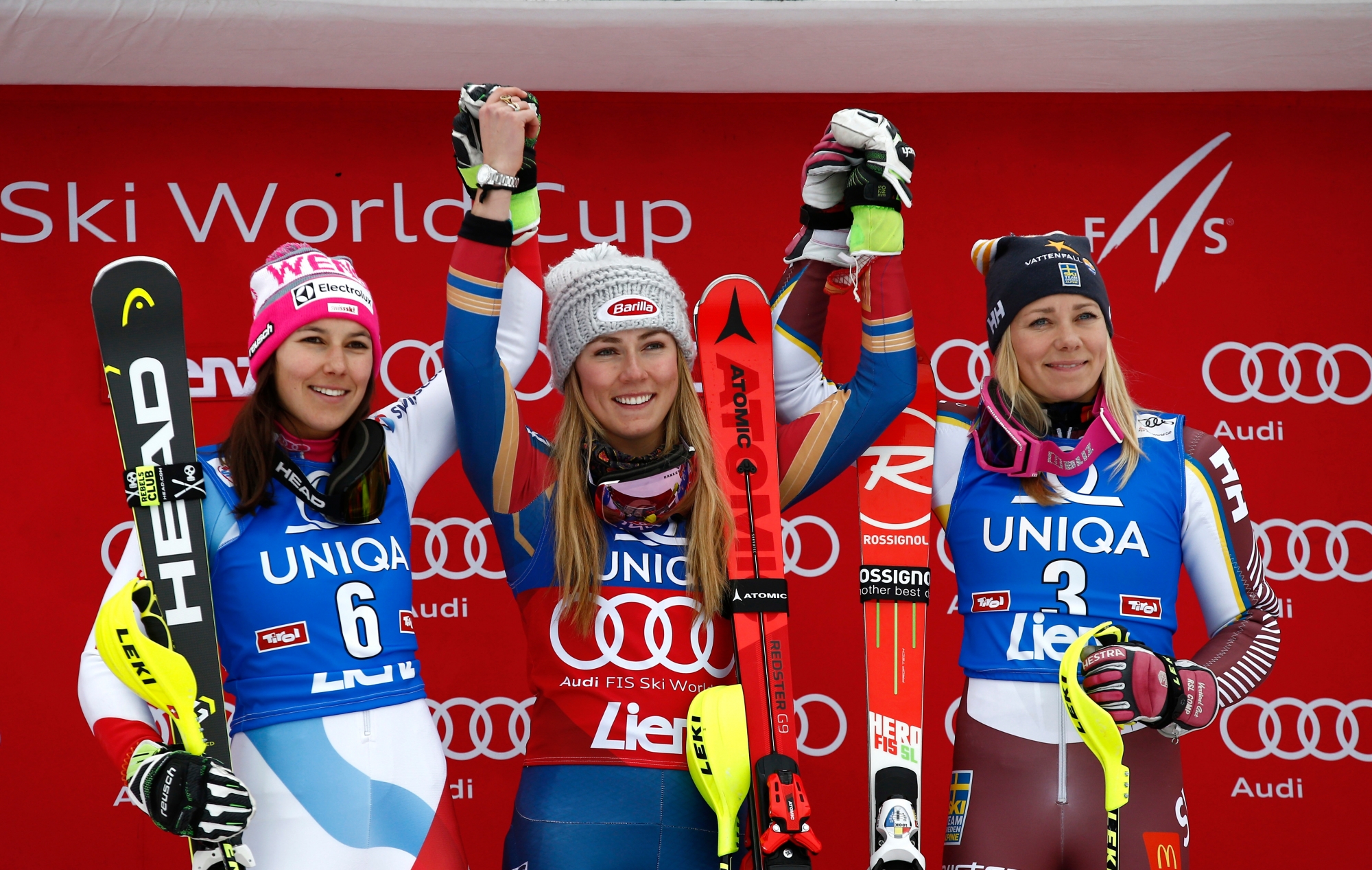 From left, second placed Switzerland's Wendy Holdener, first placed United States' Mikaela Shiffrin and third placed Sweden's Frida Hansdotter celebrate on the podium of an alpine ski, women's World Cup slalom, in Lienz, Austria, Thursday, Dec. 28, 2017. (AP Photo/Giovanni Auletta) Austria Alpine Skiing World Cup