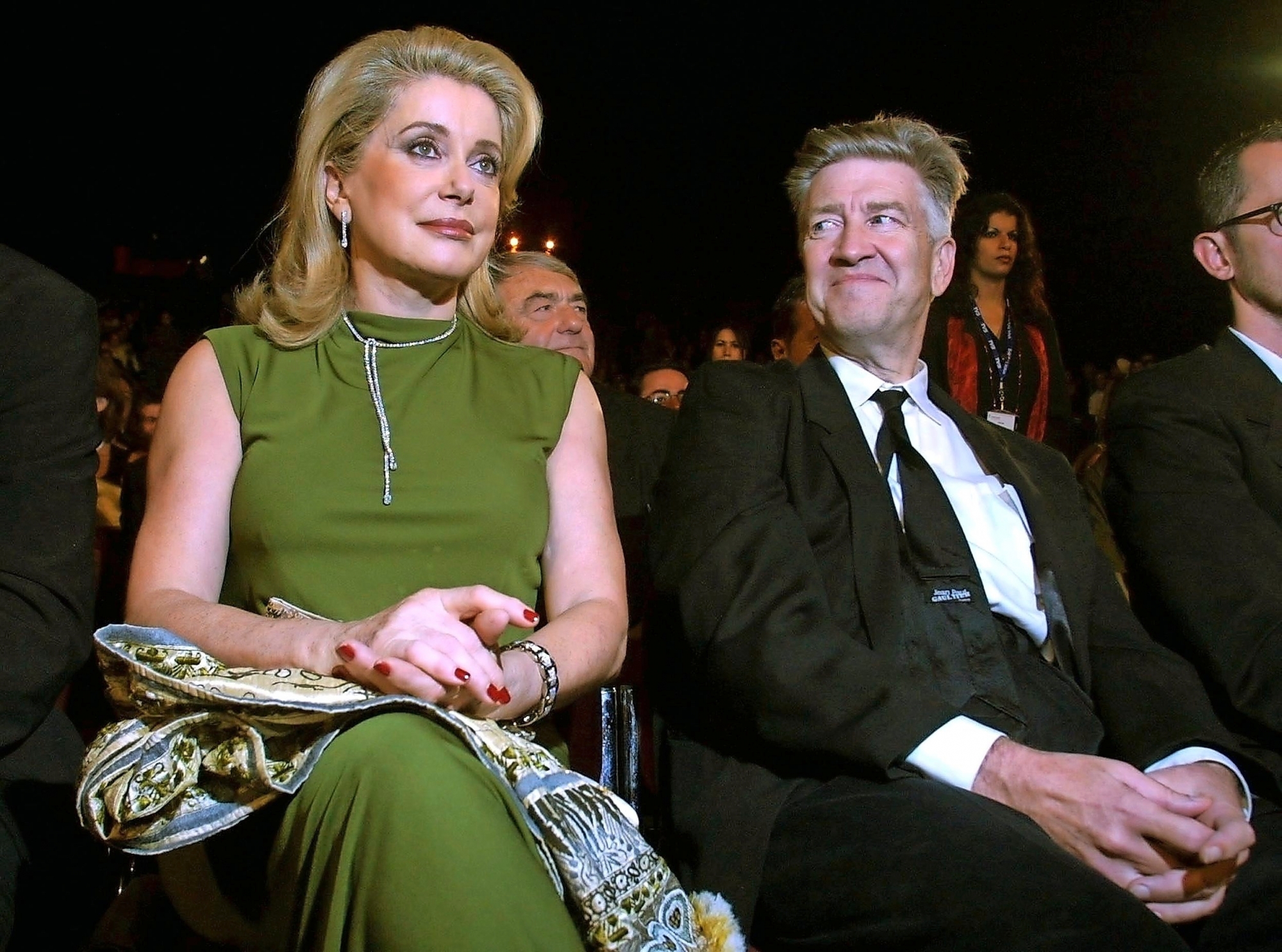 US director David Lynch (R) smiles at French actress Catherine Deneuve 18 September 2002, at the opening of the second Marrakesh Film Festival. A constellation of star directors from Hollywood and other dazzling world actors are set to shine at the festival, which opened for the first time last year only days after the September 11 attacks in New York. (KEYSTONE/EPA/AFP/ABDELHAK SENNA) MOROCCO FILM FESTIVAL