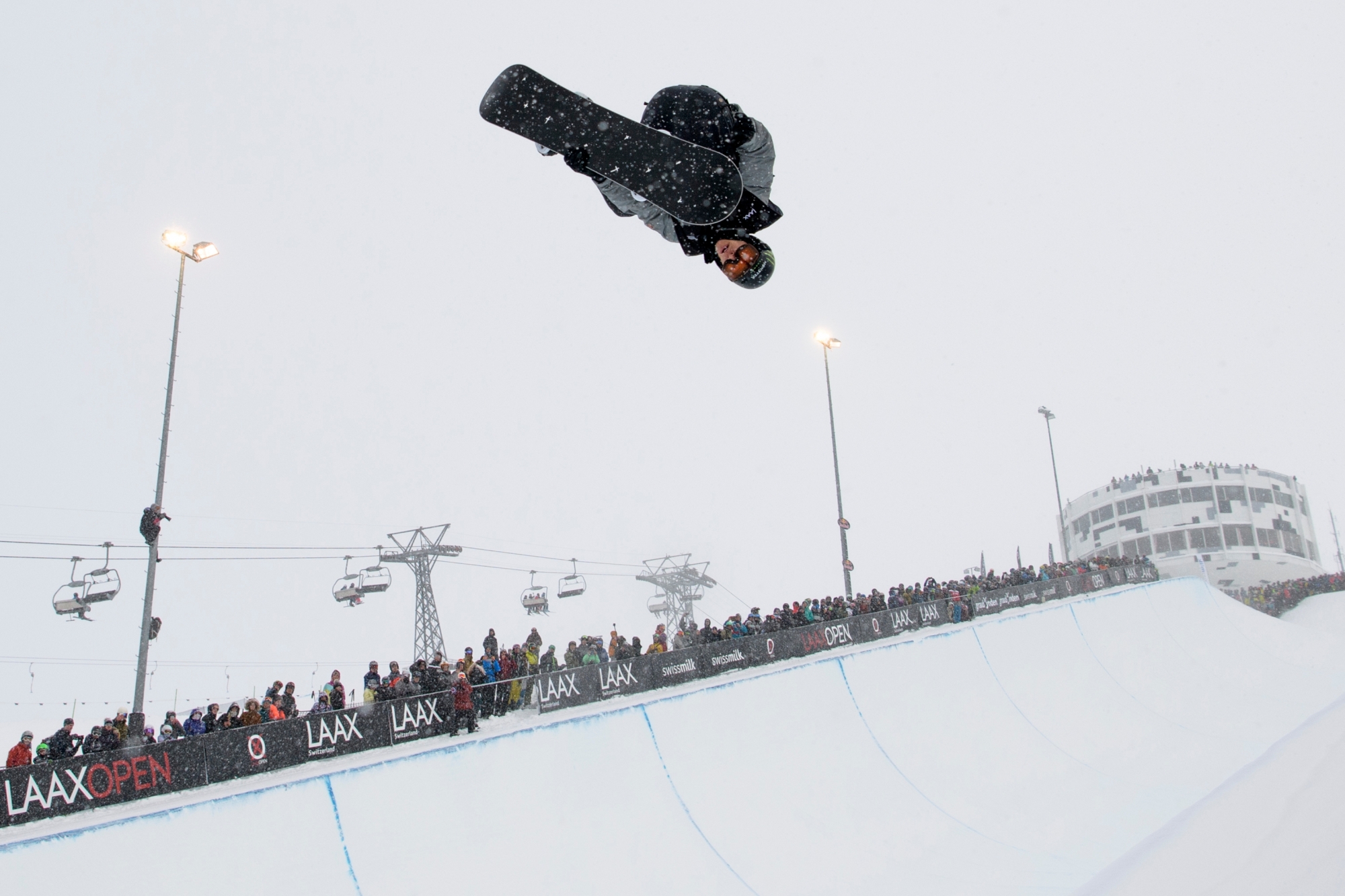 Iouri Podlatchikov of Switzerland competes during the halfpipe final, at the Laax Open Snowboard tournament, on Saturday, January 20, 2018, in Laax, Switzerland. (KEYSTONE/Gian Ehrenzeller) SWITZERLAND SNOWBOARD LAAX OPEN HALFPIPE