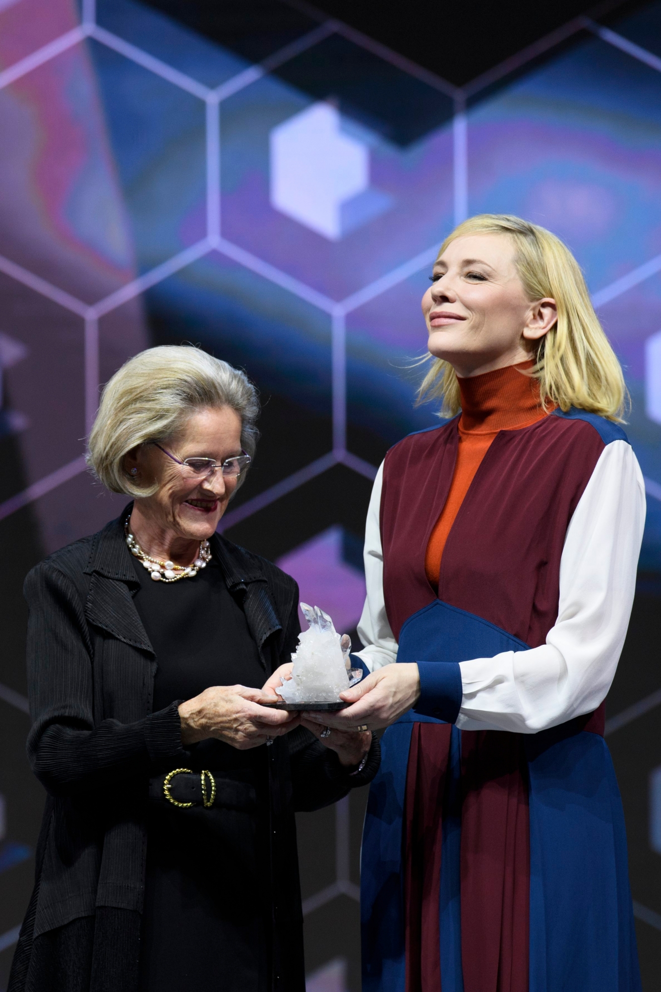 Australian actress and UNHCR Goodwill Ambassador Cate Blanchett, right, receives the Crystal Award from German Hilde Schwab, left, Chairperson and Co-Founder of Schwab Foundation for Social Entrepreneurship during the Crystal Award Ceremony on the eve of the 48th Annual Meeting of the World Economic Forum, WEF, in Davos, Switzerland, Monday, January 22, 2018. The meeting brings together enterpreneurs, scientists, chief executive and political leaders in Davos January 23 to 26.(KEYSTONE/Laurent Gillieron) SWITZERLAND WORLD ECONOMIC FORUM WEF