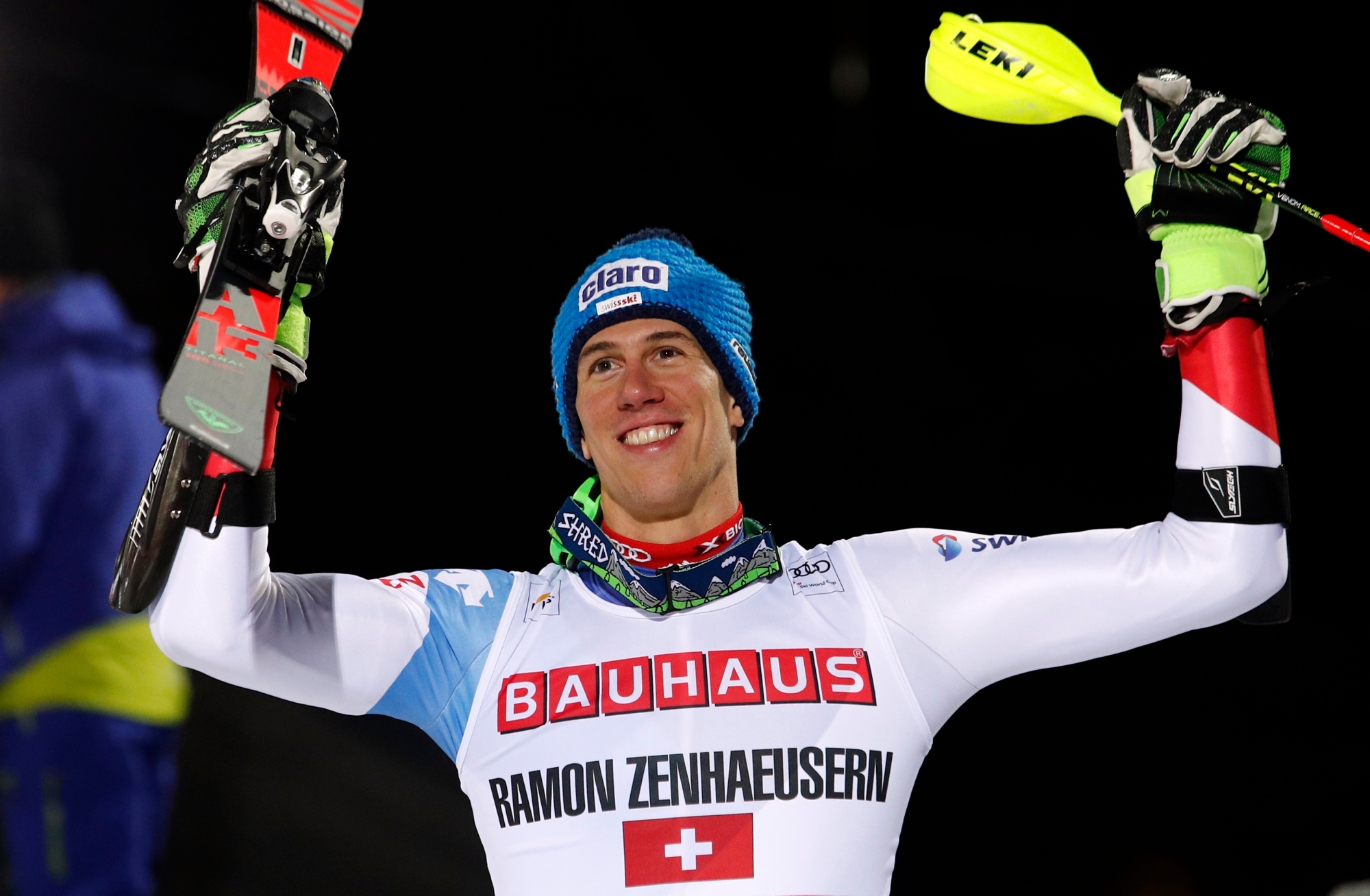 Switzerland's Ramon Zenhaeussern celebrates after winning an alpine ski, women's World Cup city event, in Stockholm, Tuesday, Jan. 30, 2018. (AP Photo/Gabriele Facciotti) Sweden Alpine Skiing World Cup