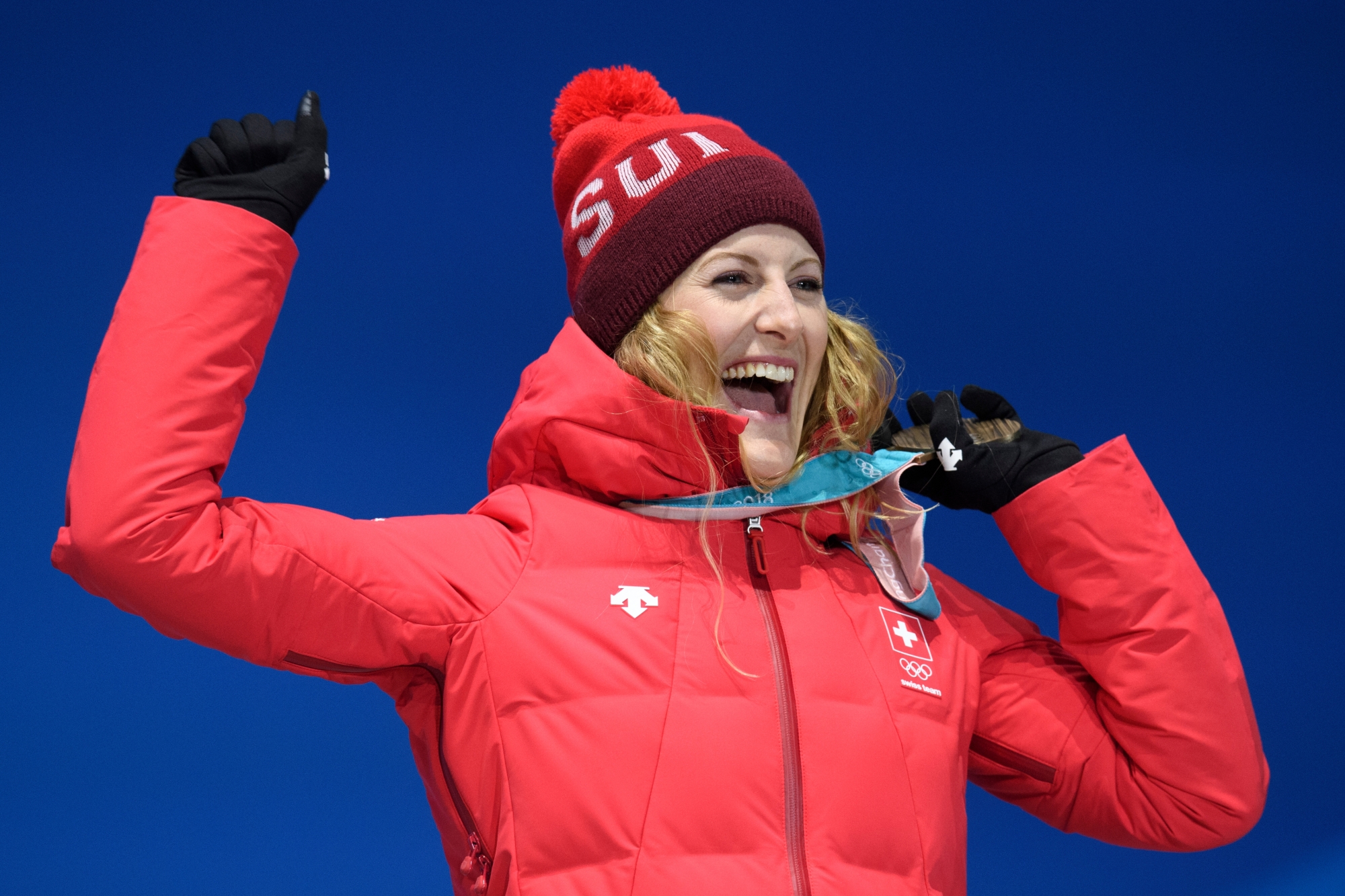 Bronze medalist Fanny Smith of Switzerland celebrates during the victory ceremony on the Medal Plaza for the women Freestyle Skiing Ski Cross event at the XXIII Winter Olympics 2018 in Pyeongchang, South Korea, on Friday, February 23, 2018. (KEYSTONE/Gian Ehrenzeller) PYEONGCHANG 2018 OLYMPICS FREESTYLE SKIING CROSS