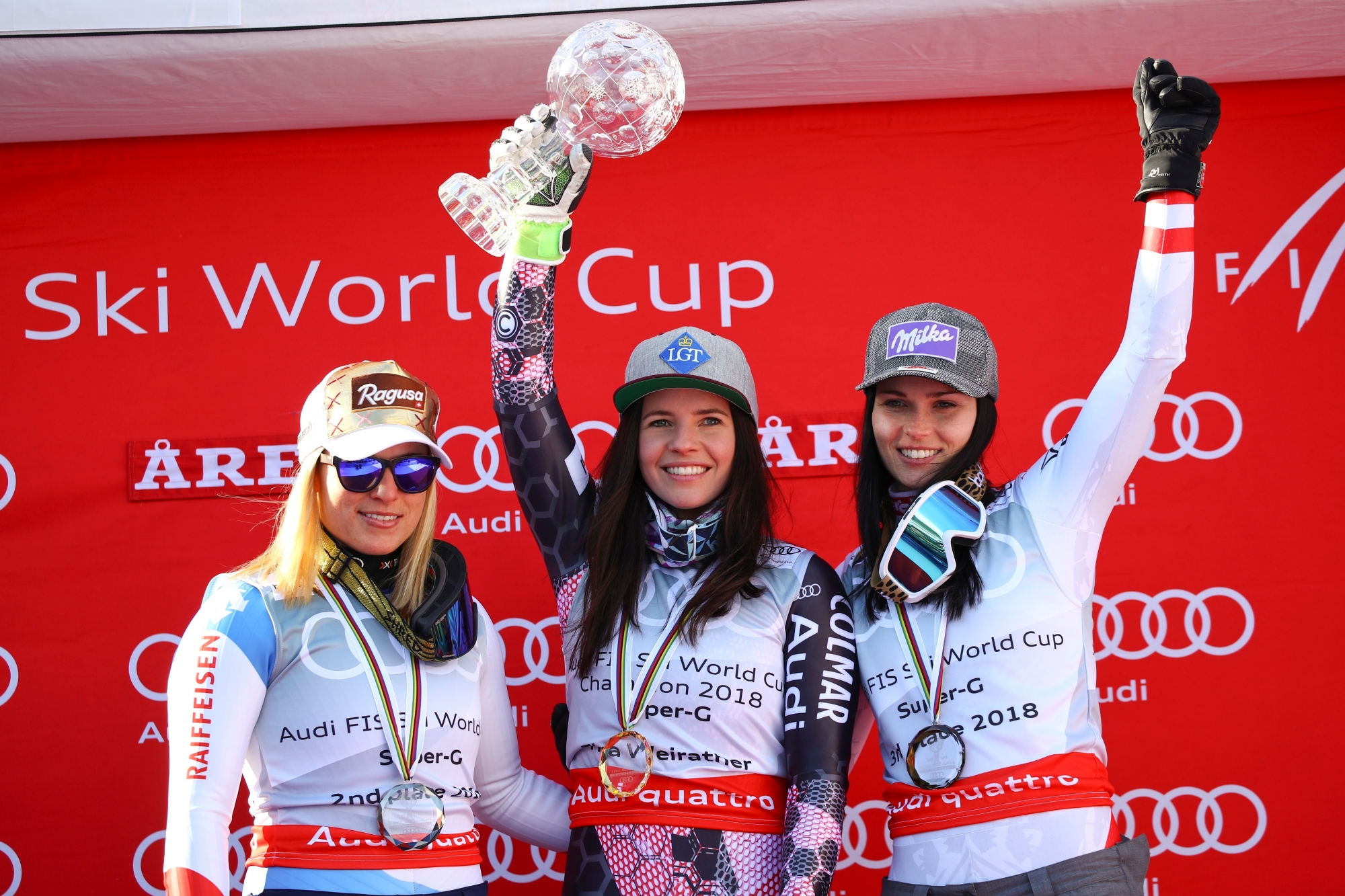 Liechtenstein's Tina Weirather, center, holds the women's World Cup super-G discipline trophy, flanked by second placed Switzerland's Lara Gut, left, and third placed Austria's Anna Veith, at the alpine ski World Cup finals in Are, Sweden, Thursday, March 15, 2018. (AP Photo/Marco Trovati) Sweden Alpine Skiing World Cup