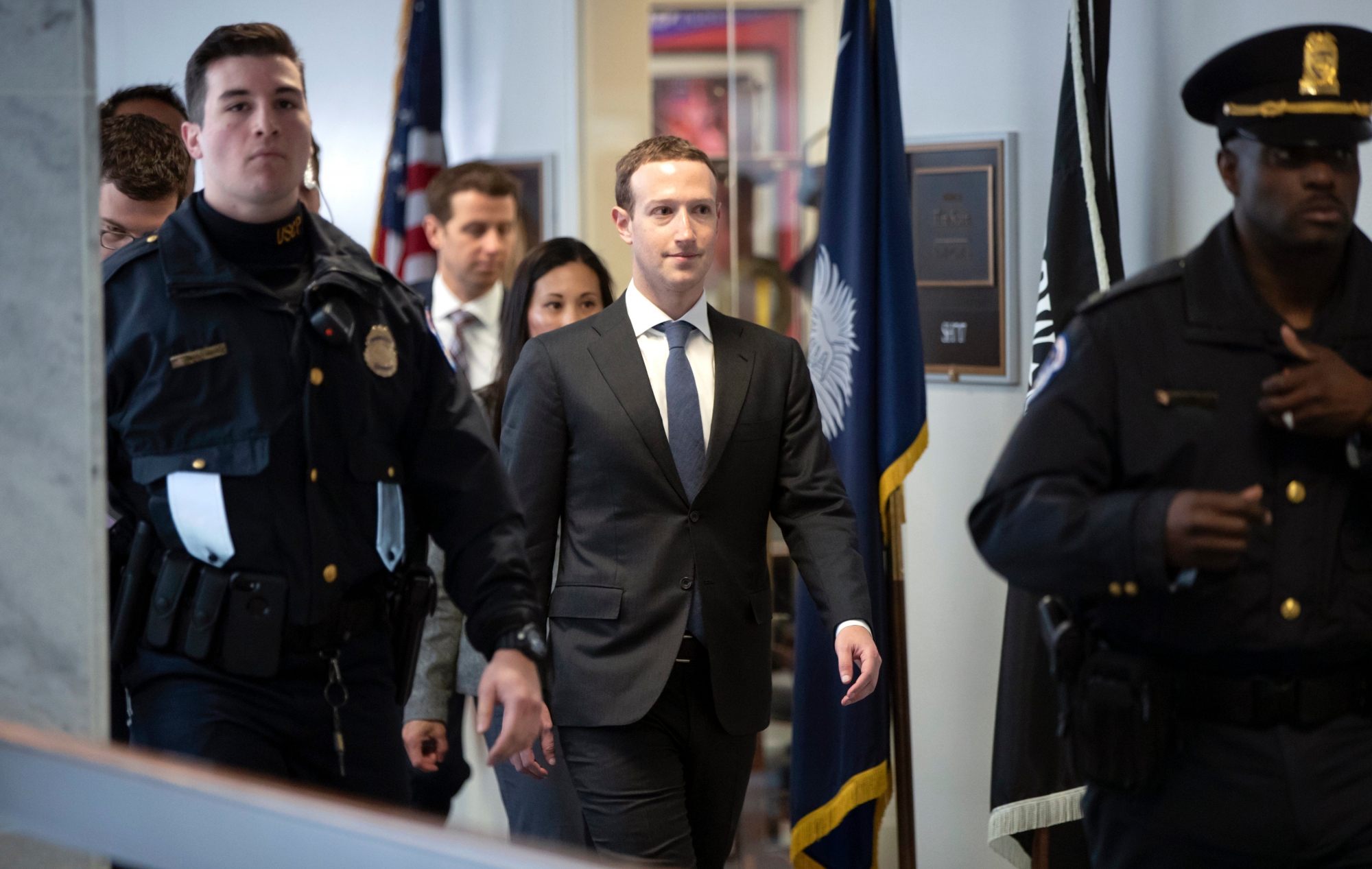 Facebook CEO Mark Zuckerberg leaves a meeting with Sen. Bill Nelson, D-Fla., the ranking member of the Senate Commerce Committee, on Capitol Hill in Washington, Monday, April 9, 2018. Zuckerberg will testify Tuesday before a joint hearing of the Commerce and Judiciary Committees about the use of Facebook data to target American voters in the 2016 election. (AP Photo/J. Scott Applewhite) Facebook Privacy Scandal Congress