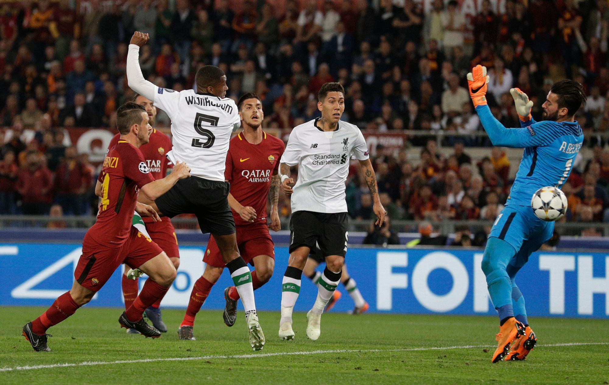Liverpool's Georginio Wijnaldum scores his side's second goal during the Champions League semifinal second leg soccer match between Roma and Liverpool at the Olympic Stadium in Rome, Wednesday, May 2, 2018. (AP Photo/Andrew Medichini) Italy Soccer Champions League