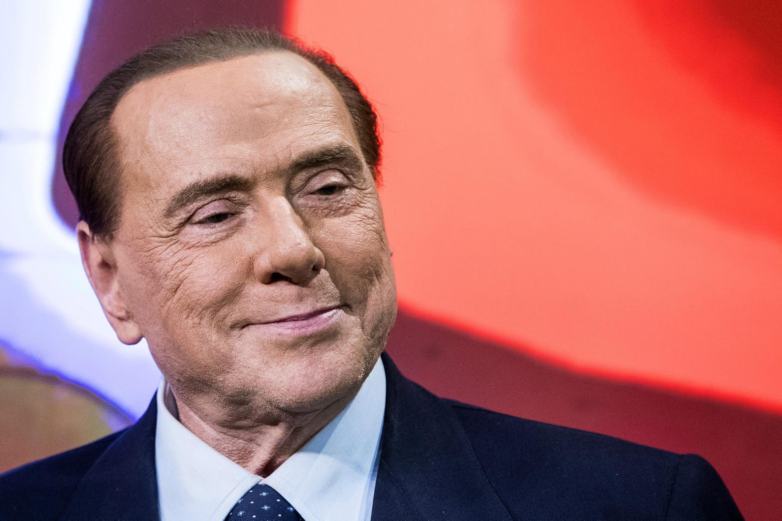 Italian former prime minister and leader of 'Forza Italia' party Silvio Berlusconi arrives the recording of LA7 program 'Bersaglio Mobile', in Rome, Friday, March 2, 2018. (Angelo Carconi/ANSA via AP) Italy Elections