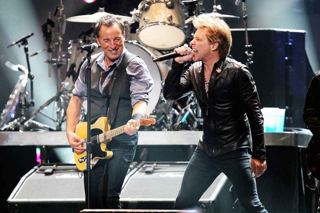 In this image released by Starpix, Bruce Springsteen, left, and Jon Bon Jovi perform during 12-12-12 The Concert for Sandy Relief at Madison Square Garden in New York on Wednesday, Dec. 12, 2012. Proceeds from the show will be distributed through the Robin Hood Foundation. (AP Photo/Starpix, Dave Allocca)