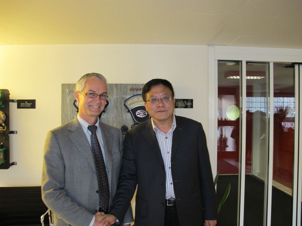 Nicolas Antille directeur de Sierre Energie et Zhou Zhengfeng, Chief Accountant de la société électrique chinoise de la province du Yunnan, la Yunnan Power Grid Corporation (73'000 employés).