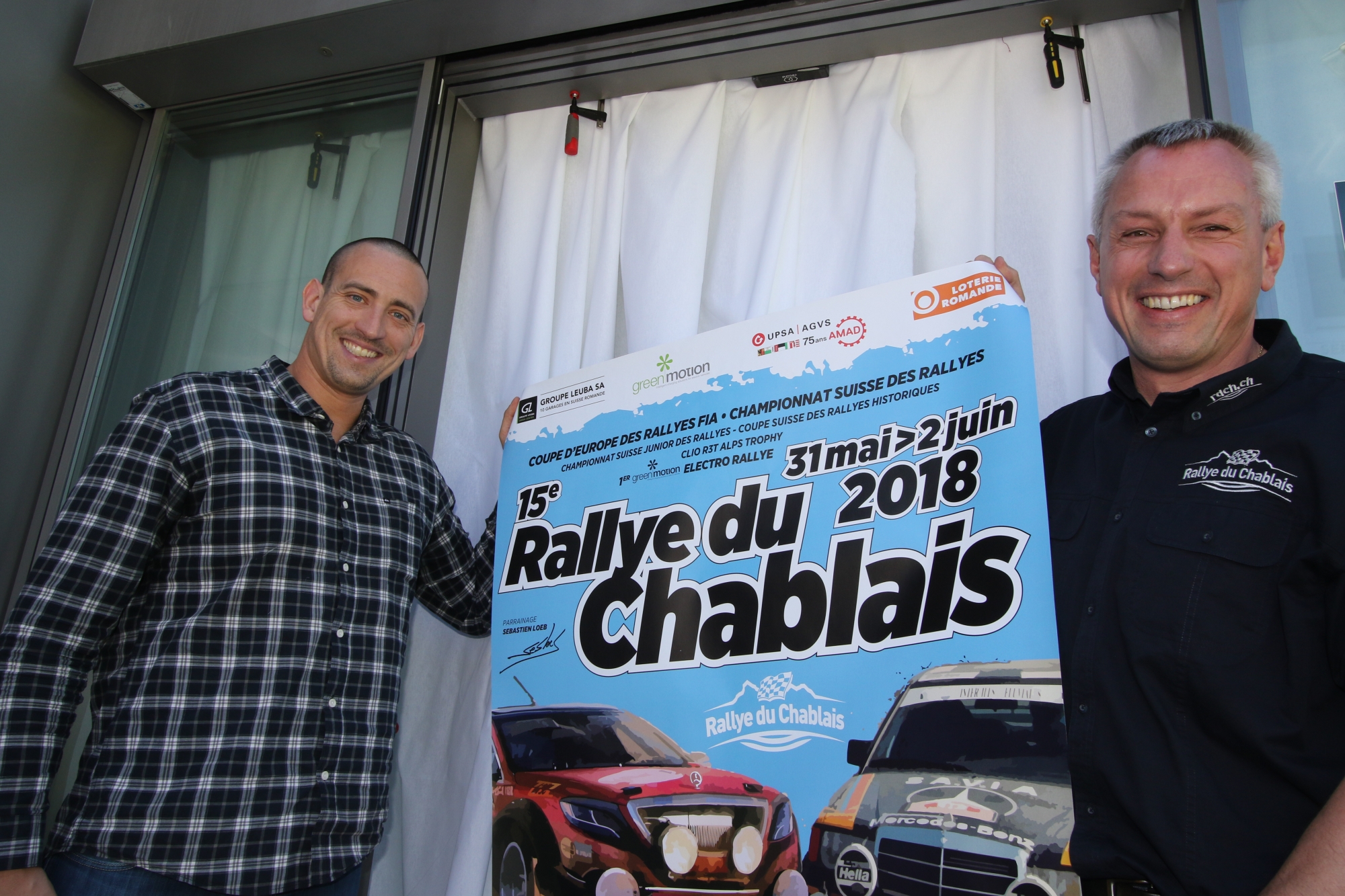 François Randin, CEO de Green Motion et Eric Jardon, patron du rallye du Chablais, présentent l'affiche 2018. Et si une troisième voiture, un véhicule électrique, venait s'ajouter sur l'affiche 2019?