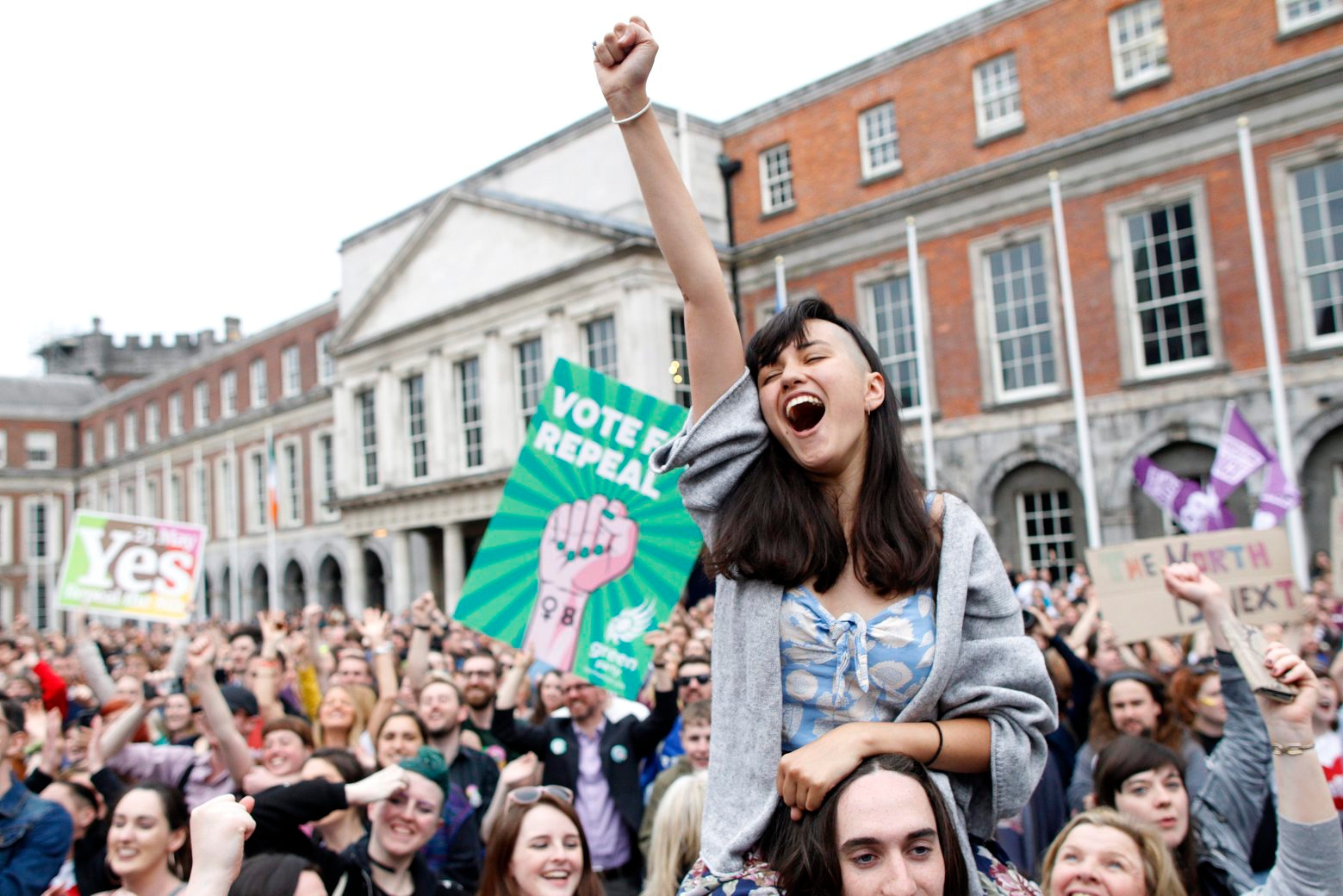 A woman from the"Yes" campaign reacts after the final result was announced, after the Irish referendum on the 8th Amendment of the Irish Constitution at Dublin Castle, in Dublin, Ireland, Saturday May 26, 2018. The prime minister of Ireland says the passage of a referendum paving the way for legalized abortions is a historic day for his country and a great act of democracy. (AP Photo/Peter Morrison) APTOPIX Ireland Abortion Referendum