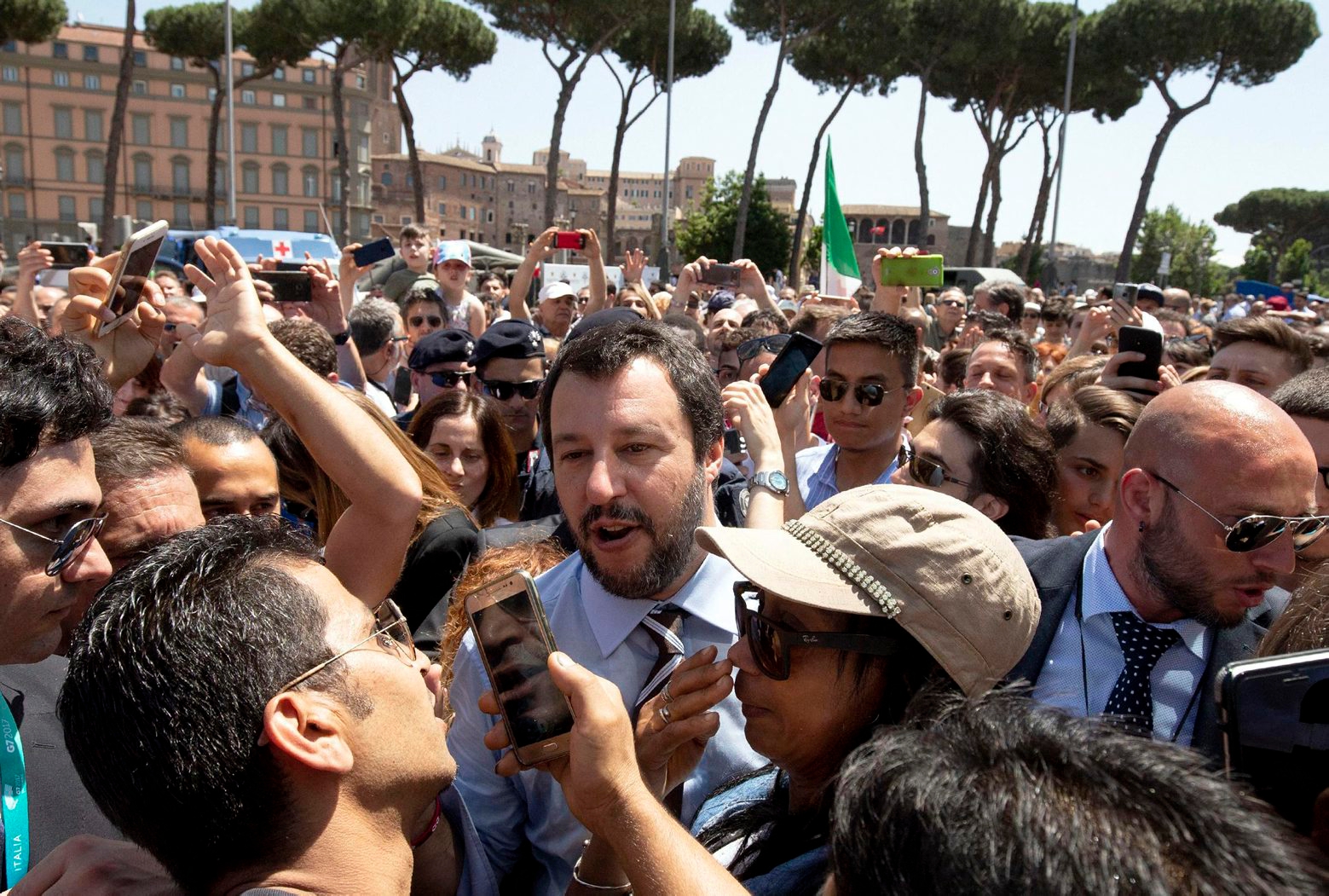 Leader of the League party and Italian Interior Minister, Matteo Salvini, walks through the crowd on the occasion of celebrations for Italy's Republic Day, in Rome Saturday, June 2, 2018. At an oath-taking ceremony in the presidential palace atop Quirinal Hill, the new premier, political novice Giuseppe Conte, and his 18 Cabinet ministers pledged their loyalty to the Italian republic and to the nation's post-war constitution in front of President Sergio Mattarella. (Claudio Peri/ANSA via AP) Italy Politics