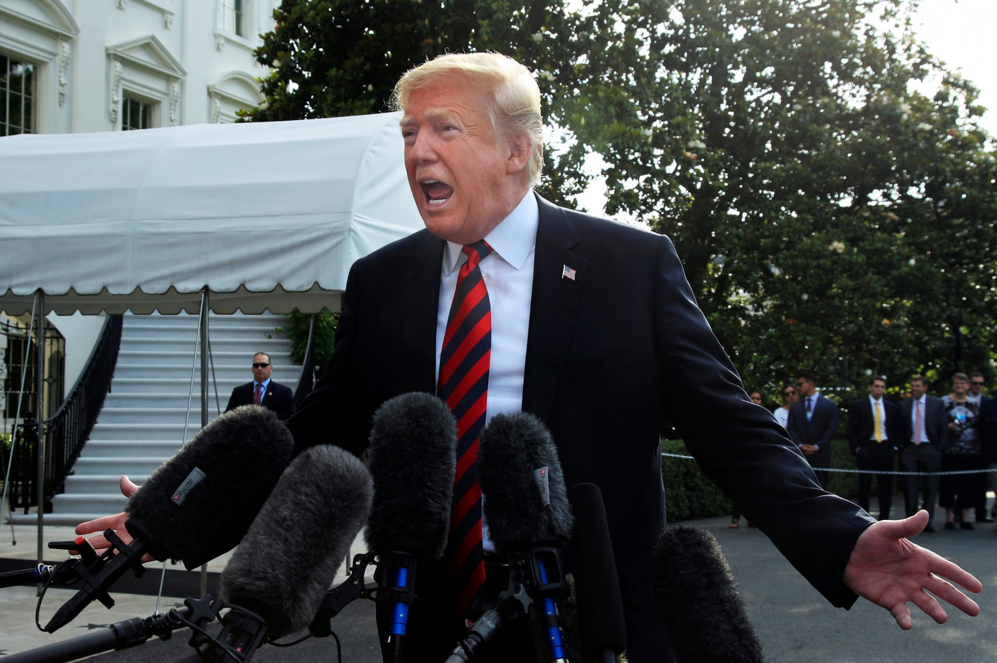 President Donald Trump speaks to reporters before leaving the White House in Washington, Friday, June 8, 2018, to attend the G7 Summit in Charlevoix, Quebec, Canada. (AP Photo/Manuel Balce Ceneta) Trump