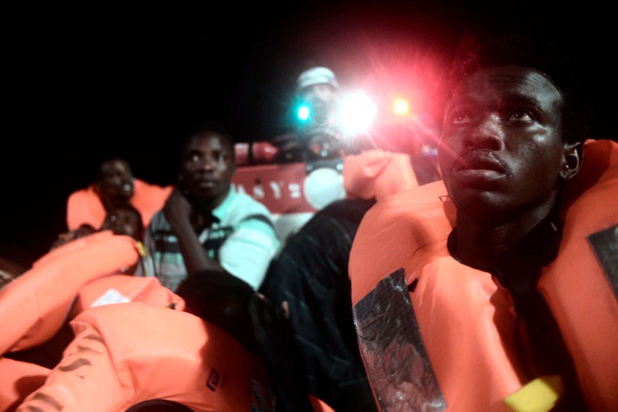 This undated photo released by by French NGO "SOS Mediterranee" on Monday June 11, 2018 and posted on it's Twitter account, shows migrants aboard SOS Mediterranee's Acquarius ship and MSF (Doctors Without Borders) NGOs, in the Mediterranean Sea. Italy and Malta dug in for a second day and refused to let the rescue ship Acquarius with 629 people aboard dock in their ports, leaving the migrants at sea as a diplomatic standoff escalated under Italy's new anti-immigrant government. (Kenny Karpov/SOS Mediterranee via AP) Europe Migrants