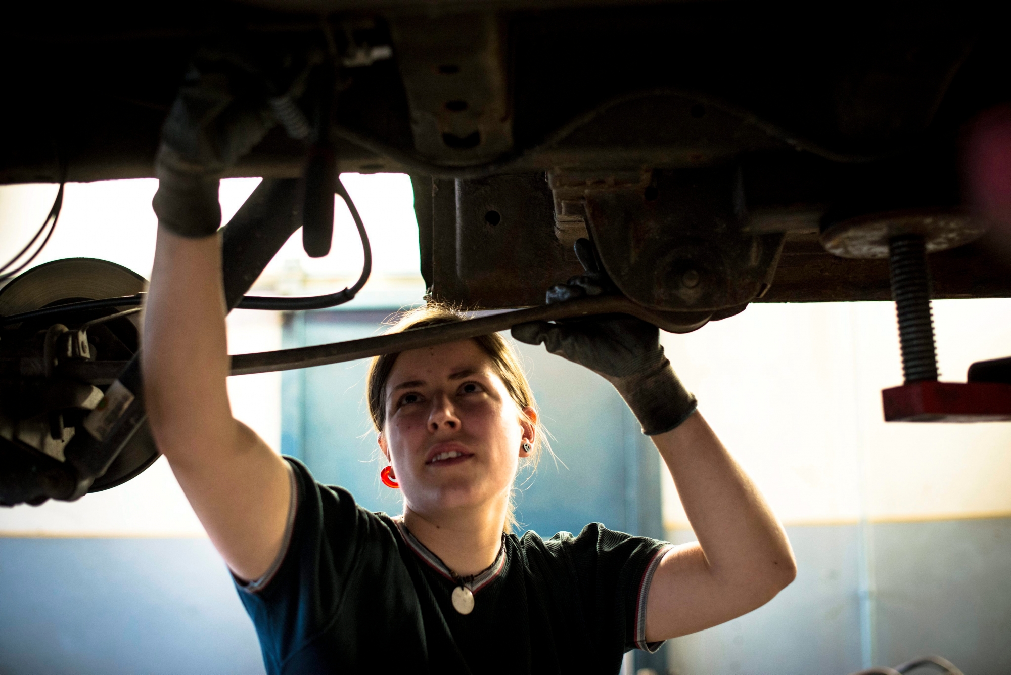 epa05199596 (11/27) Car mechanic Adrienn Jandzso works in the repair workshop of the Veszprem Department of the National Ambulance Service in Veszprem, 108 kms southwest of Budapest, Hungary, 25 February 2016. The photo series was created to mark the upcoming International Women's Day (IWD), which was marked for the first time in 1911 and is celebrated on 08 March since 1913. March 08 was proclaimed by the United Nations General Assembly as the day for women's rights and world peace in 1977.  EPA/BEA KALLOS PLEASE REFER TO ADVISORY NOTICE (epa05199585) FOR FULL PACKAGE TEXT ++ HUNGARY OUT UNGARN TAG DER FRAU