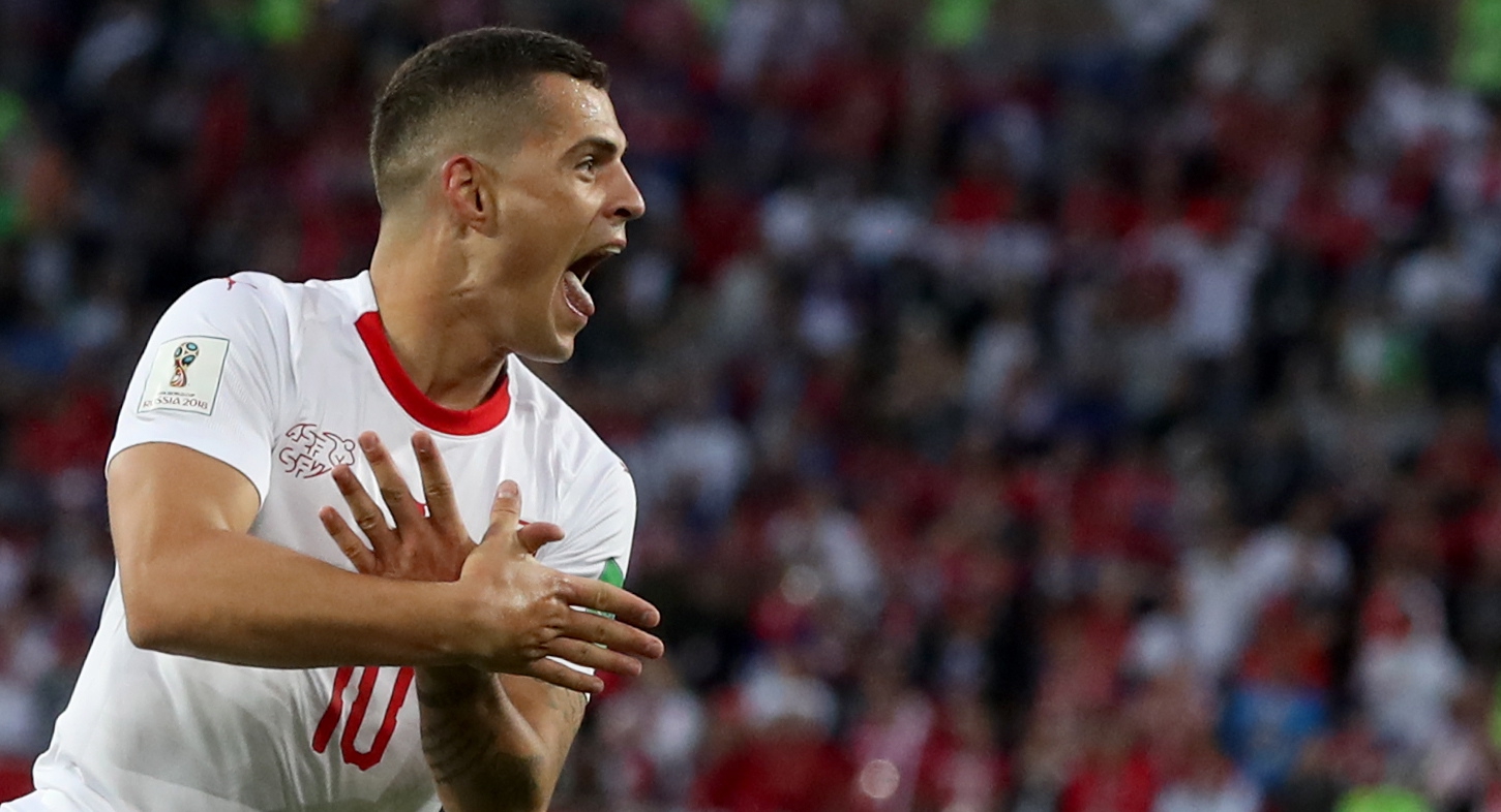 epa06831852 Granit Xhaka of Switzerland celebrates  scoring the equalizer during the FIFA World Cup 2018 group E preliminary round soccer match between Serbia and Switzerland in Kaliningrad, Russia, 22 June 2018.....(RESTRICTIONS APPLY: Editorial Use Only, not used in association with any commercial entity - Images must not be used in any form of alert service or push service of any kind including via mobile alert services, downloads to mobile devices or MMS messaging - Images must appear as still images and must not emulate match action video footage - No alteration is made to, and no text or image is superimposed over, any published image which: (a) intentionally obscures or removes a sponsor identification image; or (b) adds or overlays the commercial identification of any third party which is not officially associated with the FIFA World Cup)  EPA/MARTIN DIVISEK   EDITORIAL USE ONLYxhaka RUSSIA SOCCER FIFA WORLD CUP 2018