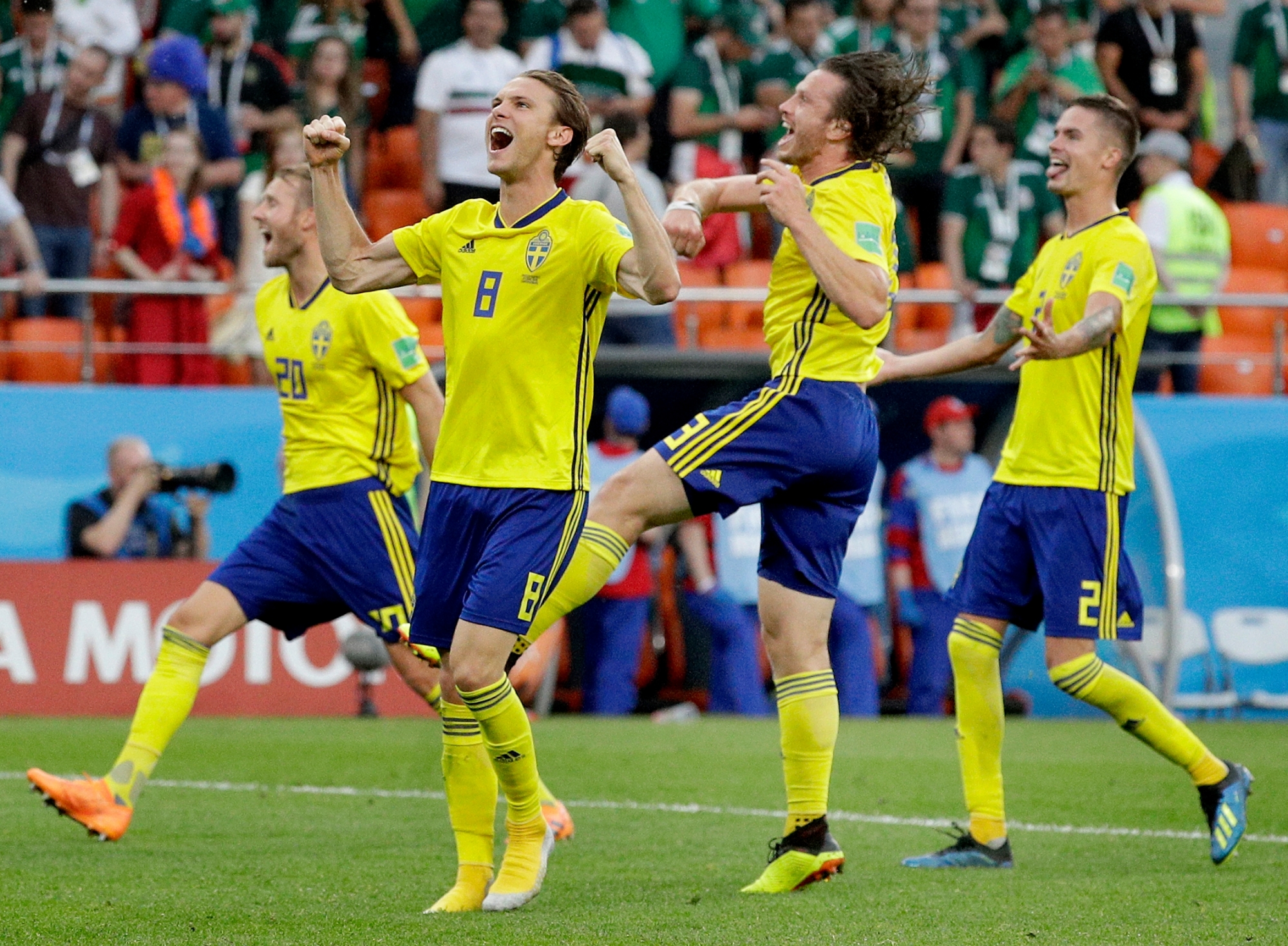 Sweden's Albin Ekdal, front, and his teammates celebrate after the group F match between Mexico and Sweden, at the 2018 soccer World Cup in the Yekaterinburg Arena in Yekaterinburg , Russia, Wednesday, June 27, 2018. (AP Photo/Gregorio Borgia)5 RUSSIA SOCCER WCUP MEXICO SWEDEN