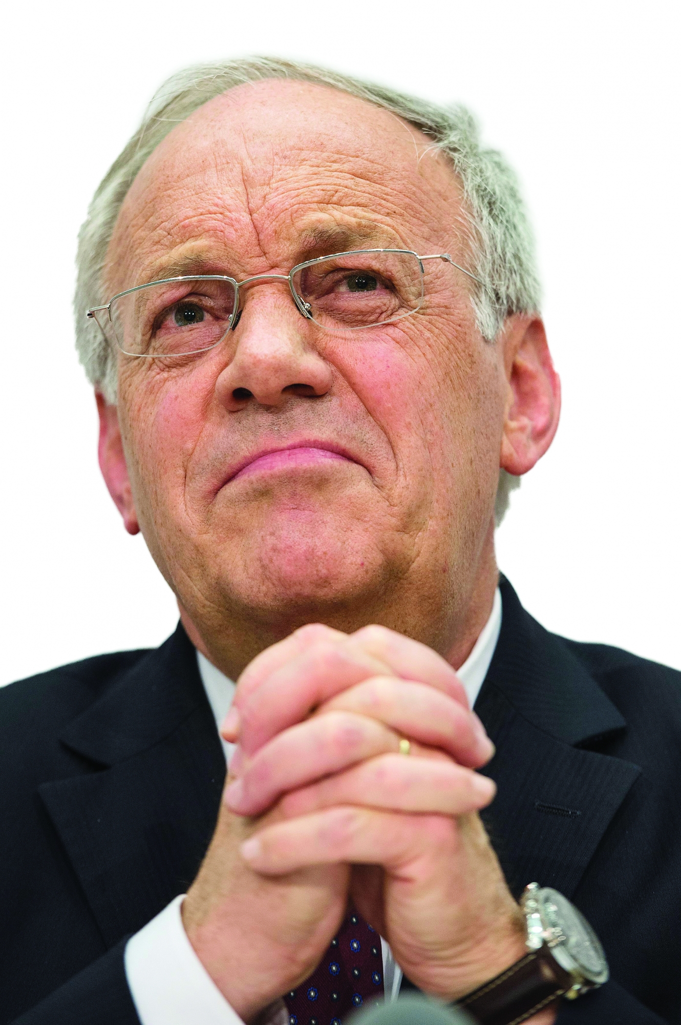 Bundesrat Johann Schneider-Ammann aeussert sich zur Mindestlohn-Initiative, am Dienstag, 25. Februar 2014, in Bern. Die Volksinitiative "Fuer den Schutz fairer Loehne" (Mindestlohn-Initiative) kommt am 18. Mai 2014 zur Abstimmung.  (KEYSTONE/ Peter Schneider) SCHWEIZ MINDESTLOHNINITIATIVE BUNDESRAT