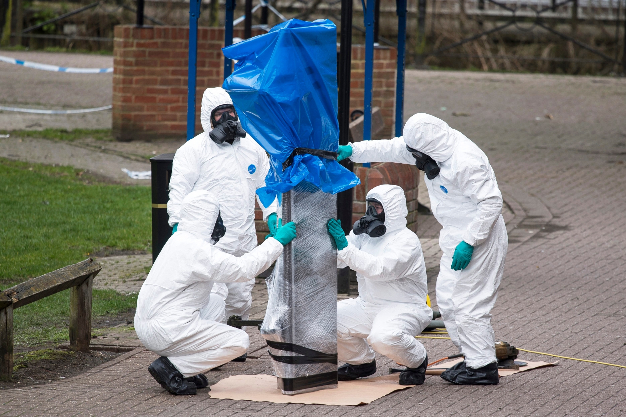 epa06897633 (FILE) - Army officers remove the bench, where Sergei Skripal and his daughter Yulia were found, in Salisbury, Wiltshire, Britain, 23 March 2018 (re-issued 19 July 2018). British media reports on 19 July 2018 state the British police have identified a number of Russians that they suspect of being behind the attack in March where Novichok nerve agent was used against former Russian spy Sergei Skripal and his daughter Yulia.  EPA/WILL OLIVER (FILE) BRITAIN CRIME NERVE AGENT ATTACK