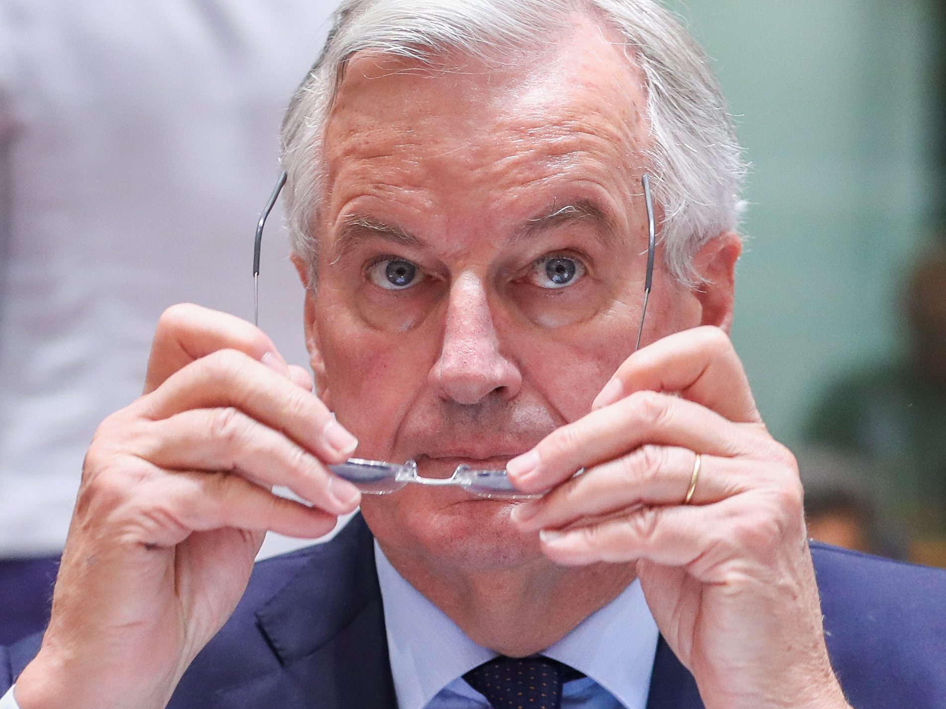 epa06899762 The European Union's chief Brexit negotiator Michel Barnier adjusts his glasses as he prepares for the General Affairs Council meeting at the European Council in Brussels, Belgium, 20 July 2018. Barnier will inform the Council, meeting in an EU 27 format, about the status of the Brexit talks with the UK. The EU27 ministers are expected to discuss the state of the Brexit talks including the white paper from the British government on the future EU-UK relations.  EPA/STEPHANIE LECOCQ BELGIUM EU GENERAL AFFAIRS COUNCIL