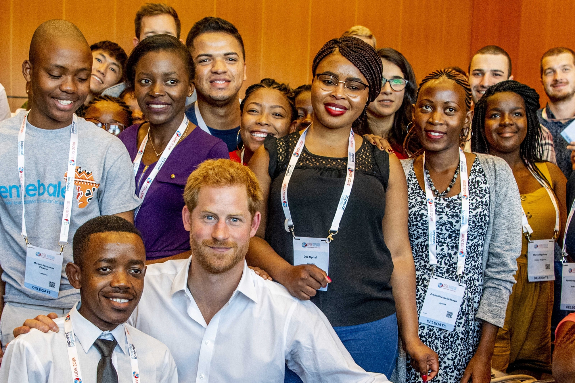 epa06906134 British Prince Harry (C-L, down) poses with delegates prior to the 22nd International AIDS Conference 2018 at the RAI Convention Center in Amsterdam, The Netherlands, 23 July 2018. The biennial conference that runs from 23 to 27 July 2018 is organized by the International AIDS Society (IAS) and is expected to welcome around 18,000 participants - including researchers from various disciplines, medical professionals, public health and community practitioners and policy planners - from all around the world.  EPA/ROBIN UTRECHT NETHERLANDS AIDS CONFERENCE