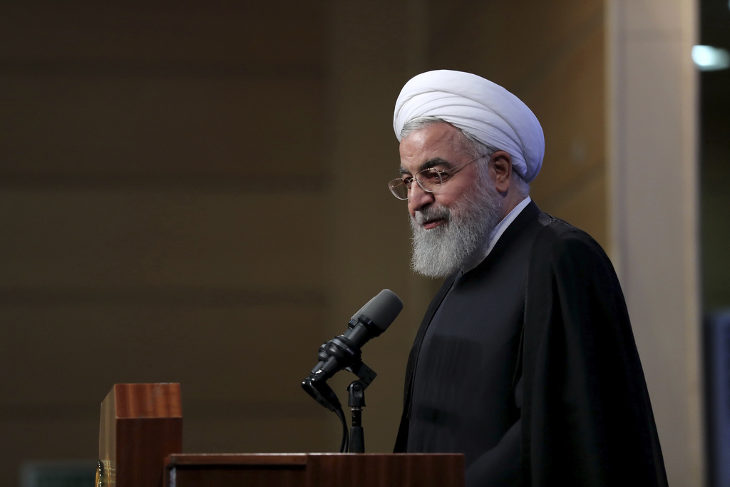 Le président de la République islamique d'Iran est en visite en Suisse pour parler des relations bilatérales entre la Suisse et l'Iran post sanctions américaines.(Iranian Presidency Office via AP)