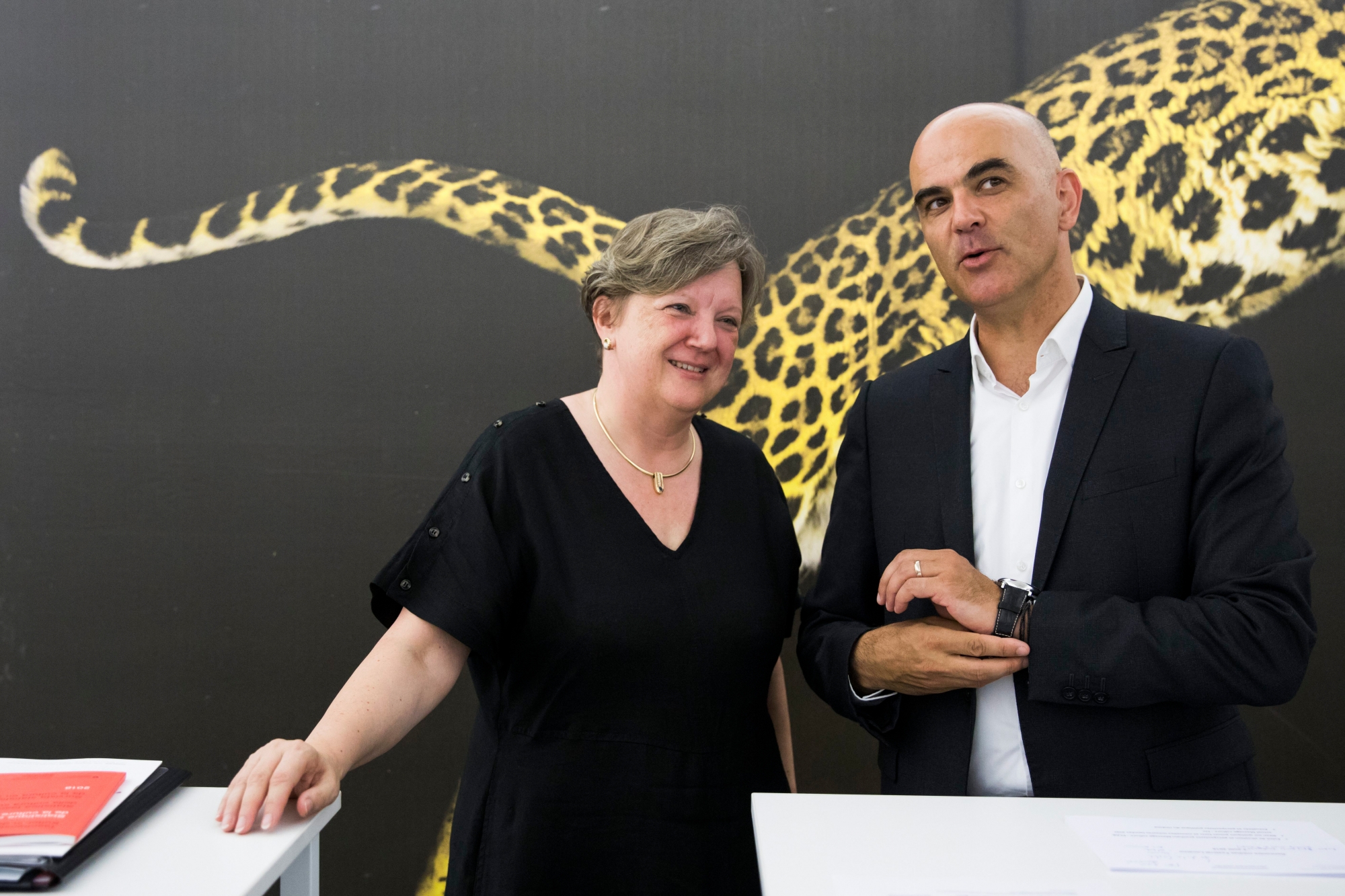 Swiss Federal President Alain Berset, right, and Isabelle Chassot, head of the Federal Office of Culture, left, attend a press conference at the 71st Locarno International Film Festival, in Locarno, Switzerland, 02 August 2018. The Festival del film Locarno 2018 runs from 01 to 11 August. (KEYSTONE/Peter Klaunzer) SWITZERLAND LOCARNO FILM FESTIVAL