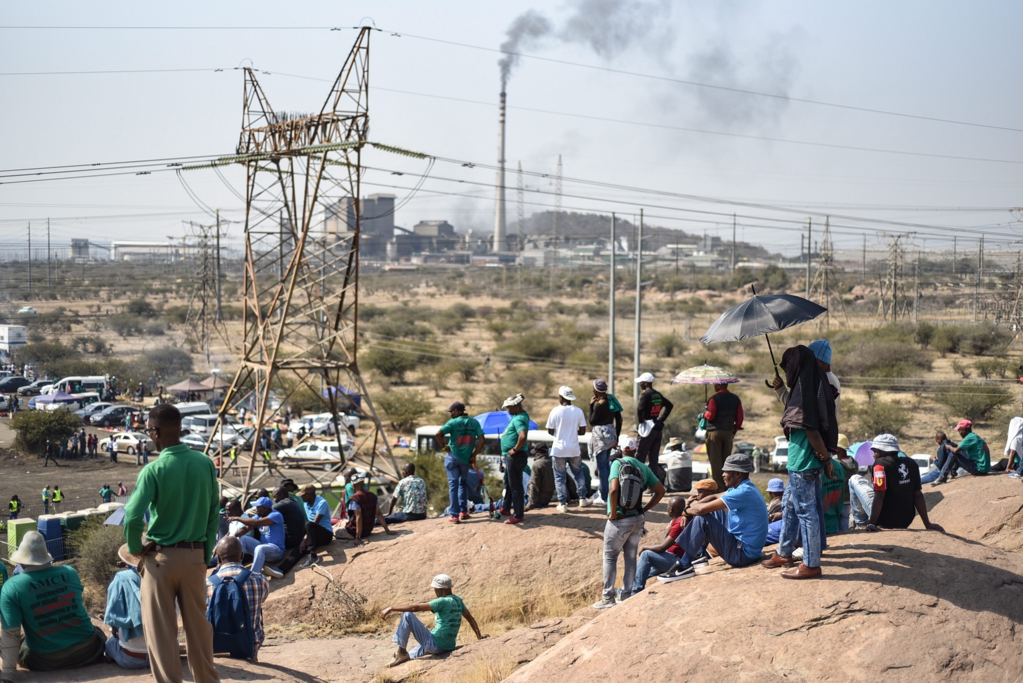 epa06952632 Miners gather on the 'Wondekop Hill' as part of the commemoration events marking the sixth anniversary of the Marikana mass shooting, in Rustenburg, South Africa, 16 August 2018. A total of 34 striking Lonmin platinum miners where killed and 70 wounded when South African Police Service (SAPS) forces opened fire with live ammunition on 16 August 2012. Although an inquest into the shooting has been completed no one has been found responsible for the shooting which is now considered a turning point in the country's history.  EPA/STR SOUTH AFRICA MARIKANA SHOOTING ANNIVERSARY