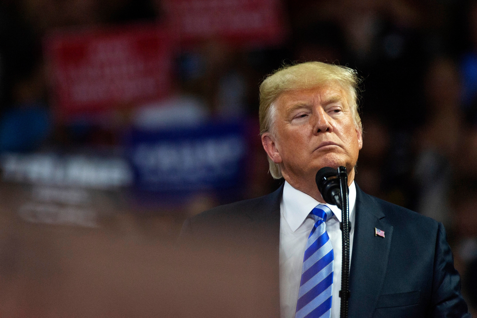 President Donald Trump takes the stage at a rally in support of the Senate candidacy of West Virginia's Attorney General Patrick Morrisey, Tuesday, Aug. 21, 2018, at the Charleston Civic Center in Charleston, W.Va. (Craig Hudson/Charleston Gazette-Mail via AP) APTOPIX Trump