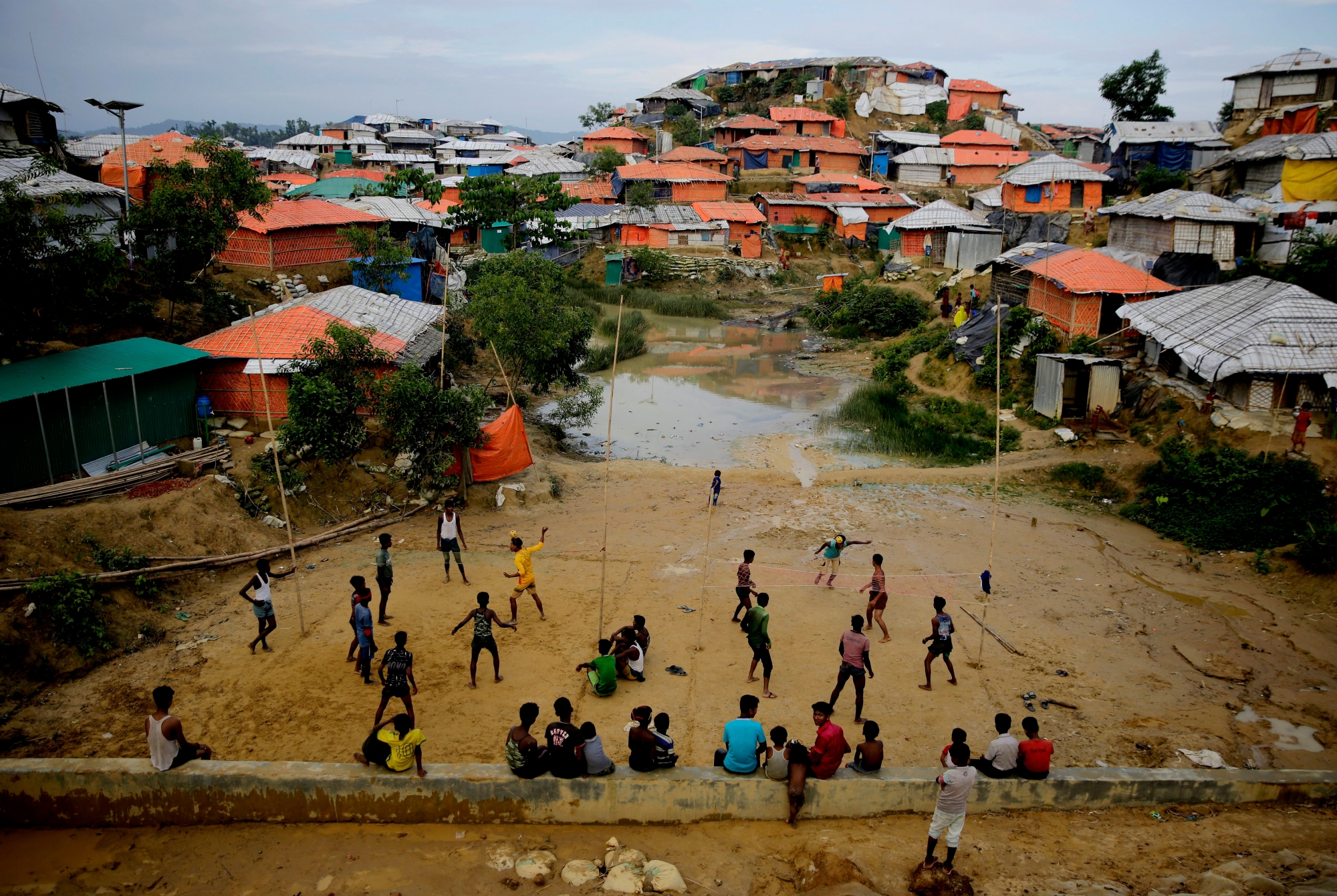 Rohingya refugees play at Balukhali Refugee Camp in Bangladesh, Monday, Aug. 27, 2018. Investigators working for the U.N.'s top human rights body said Monday that Myanmar military leaders should be prosecuted for genocide against Rohingya Muslims, taking the unusual step of identifying six by name among those behind deadly, systematic crimes against the ethnic minority. (AP Photo/Altaf Qadri) APTOPIX Bangladesh UN Myanmar Human Rights
