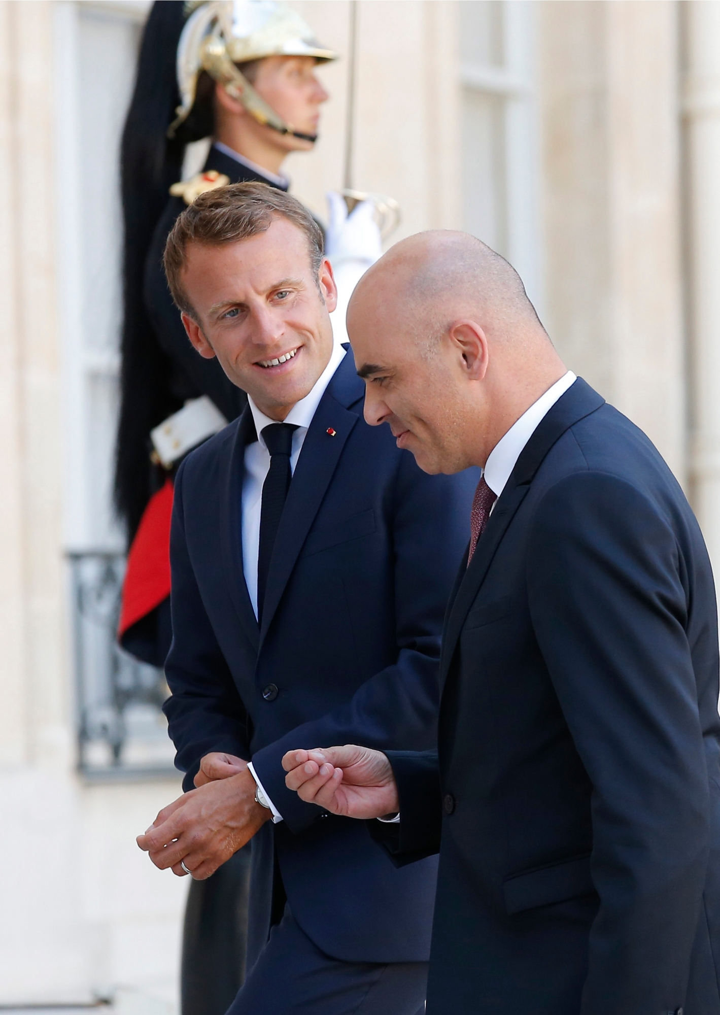 French President Emmanuel Macron, left, welcomes Swiss Federal President Alain Berset at the Elysee Palace in Paris, Wednesday, Sept. 12 2018. Swiss Federal President Alain Berset is for a two days visit in Paris. (AP Photo/Michel Euler) France Switzerland