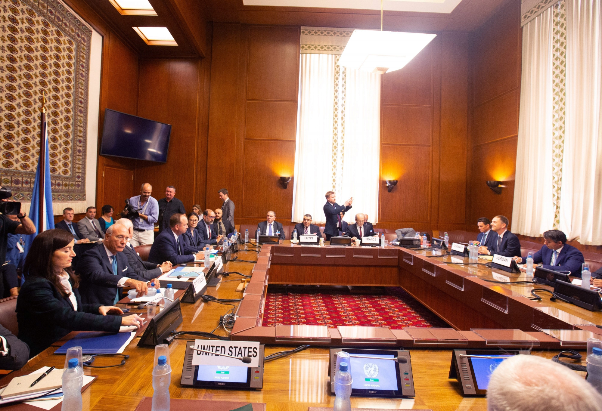 Representatives from Egypt, France, Germany, Jordan, Saudi Arabia, the United Kingdom and the United States attend a meeting, during the consultations on Syria, at the European headquarters of the United Nations in Geneva, Switzerland, on Friday, September 14, 2018. Representatives from Egypt, France, Germany, Jordan, Saudi Arabia, the United Kingdom and the United States meet with the UN Special Envoy of the Secretary-General for Syria for discussions about the situation in Syria. (KEYSTONE/XINHUA/POOL/Xu Jinquan) SWITZERLAND UN SYRIA CONSULTATIONS