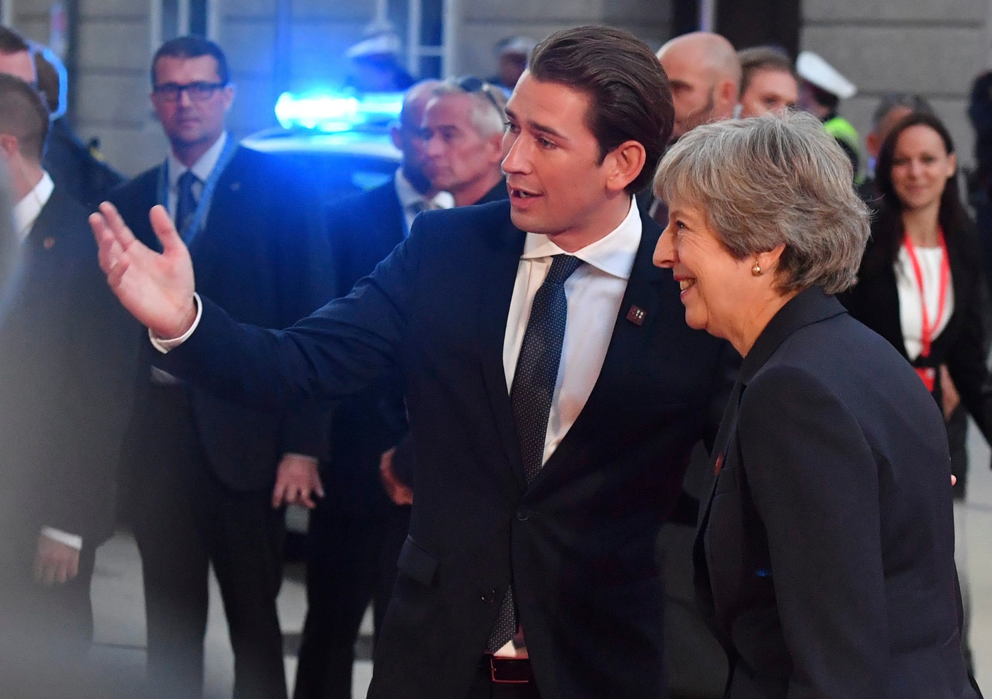 British Prime Minister Theresa May, right, talks to Austrian Chancellor Sebastian Kurz when arriving at the informal EU summit in Salzburg, Austria, Wednesday, Sept. 19, 2018. (AP Photo/Kerstin Joensson) Austria EU Summit