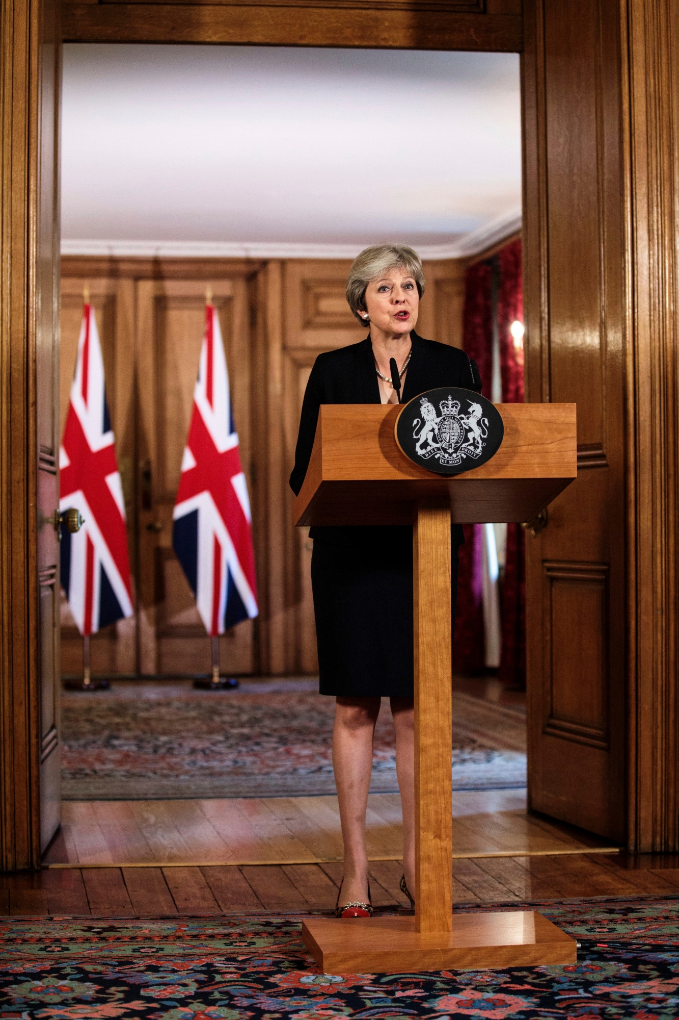 British Prime Minister Theresa May makes a statement on Brexit negotiations with the European Union, at 10 Downing Street, in London, Friday, Sept. 21, 2018. The British government on Friday accused the European Union of slamming the handbrake on Brexit negotiations, after the bloc said Prime Minister Theresa May's blueprint was unworkable. A rattled May insisted that her plan was the only one on the table Äî and that Britain was prepared to walk away from the EU without a deal if it was rejected. ( Jack Taylor/Pool Photo via AP) Britain Brexit