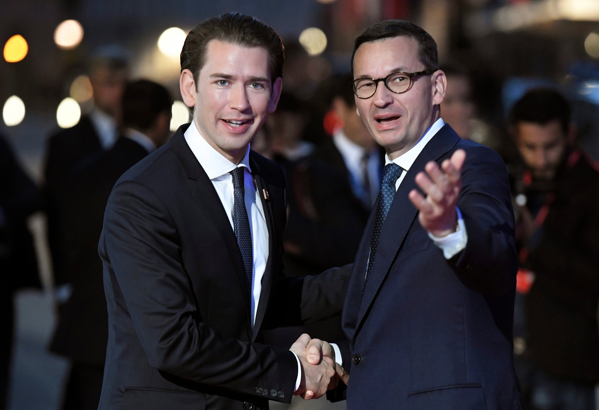 epa07032850 Federal Chancellor of Austria Sebastian Kurz (L) greets Prime Minister of Poland Mateusz Morawiecki (R), as he arrives for a dinner at the Felsenreitschule theatre, during the European Union's (EU) Informal Heads of State Summit in Salzburg, Austria, 19 September 2018. EU countries' leaders meet on 19 and 20 September for a summit to discuss internal security measures, migration and Brexit.  EPA/CHRISTIAN BRUNA AUSTRIA EU SUMMIT