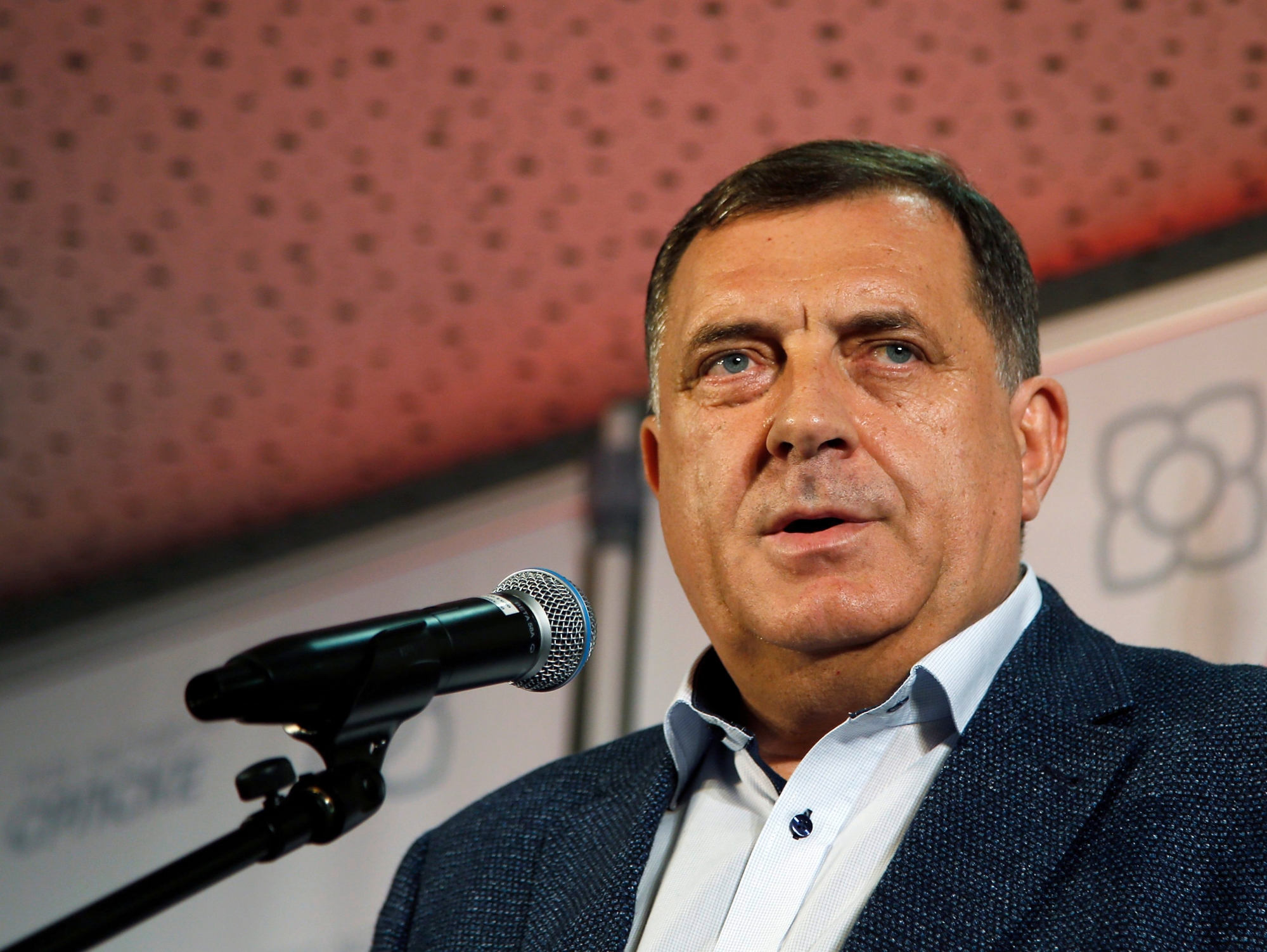 Milorad Dodik, president of the Republic of Srpska, speaks during a news conference after claiming victory in the Bosnian town of Banja Luka, 240 kilometers northwest of Sarajevo, Sunday, Oct. 7, 2018. Dodik has declared victory in the race to fill the Serb seat in Bosnia's three-member presidency. (AP Photo/Darko Vojinovic) Bosnia Election