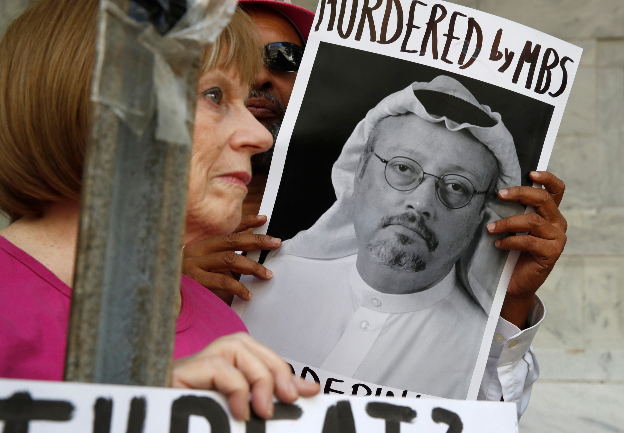 People hold signs during a protest at the Embassy of Saudi Arabia about the disappearance of Saudi journalist Jamal Khashoggi, Wednesday, Oct. 10, 2018, in Washington. (AP Photo/Jacquelyn Martin) Saudi Arabia Missing Writer